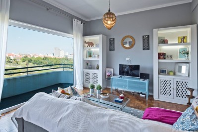 The living room - cosy up and enjoy the view from the couch. You can also head outside and watch the view from the balcony.