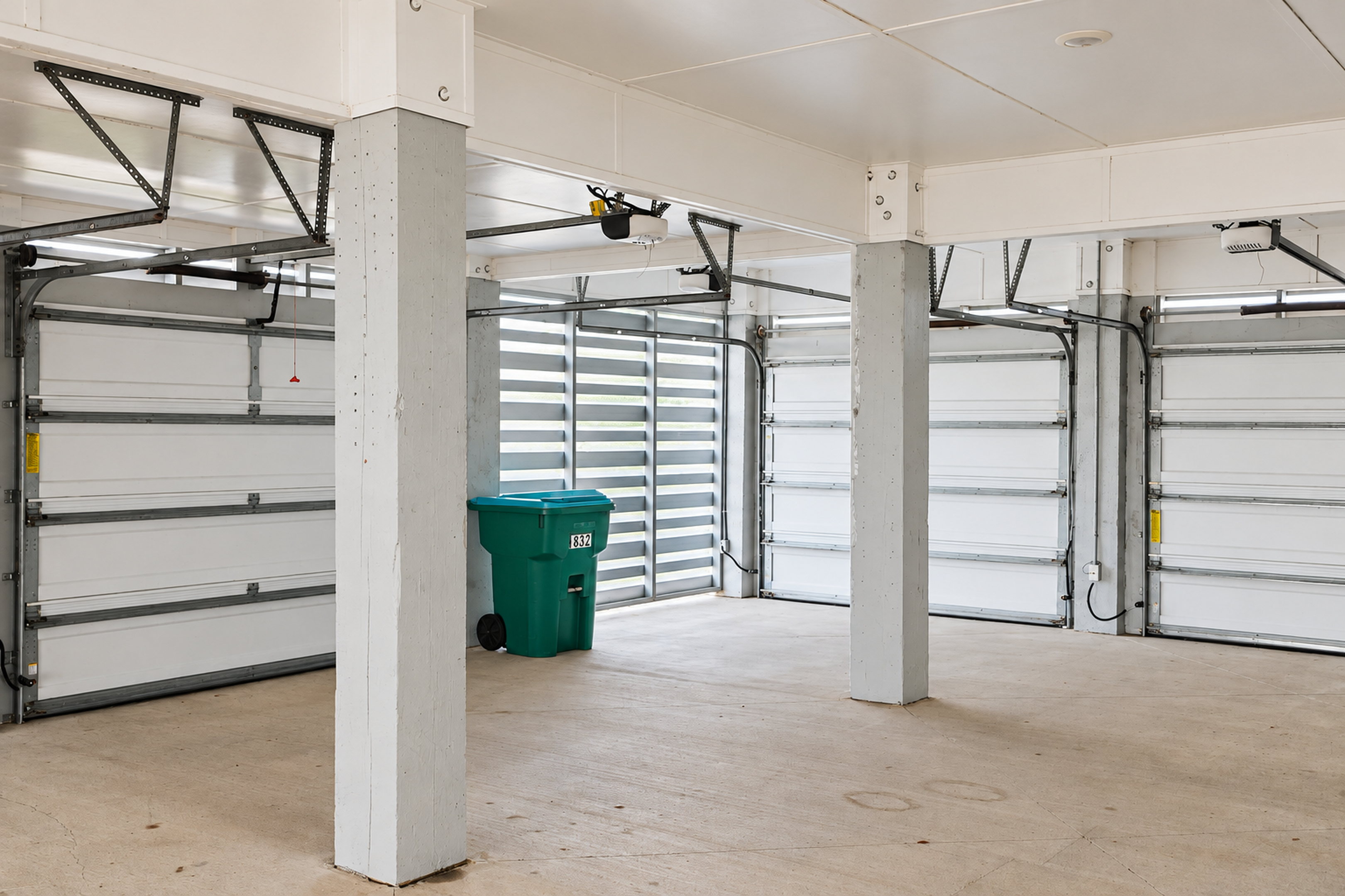 Spacious multi-bay garage with ample room for parking and storage