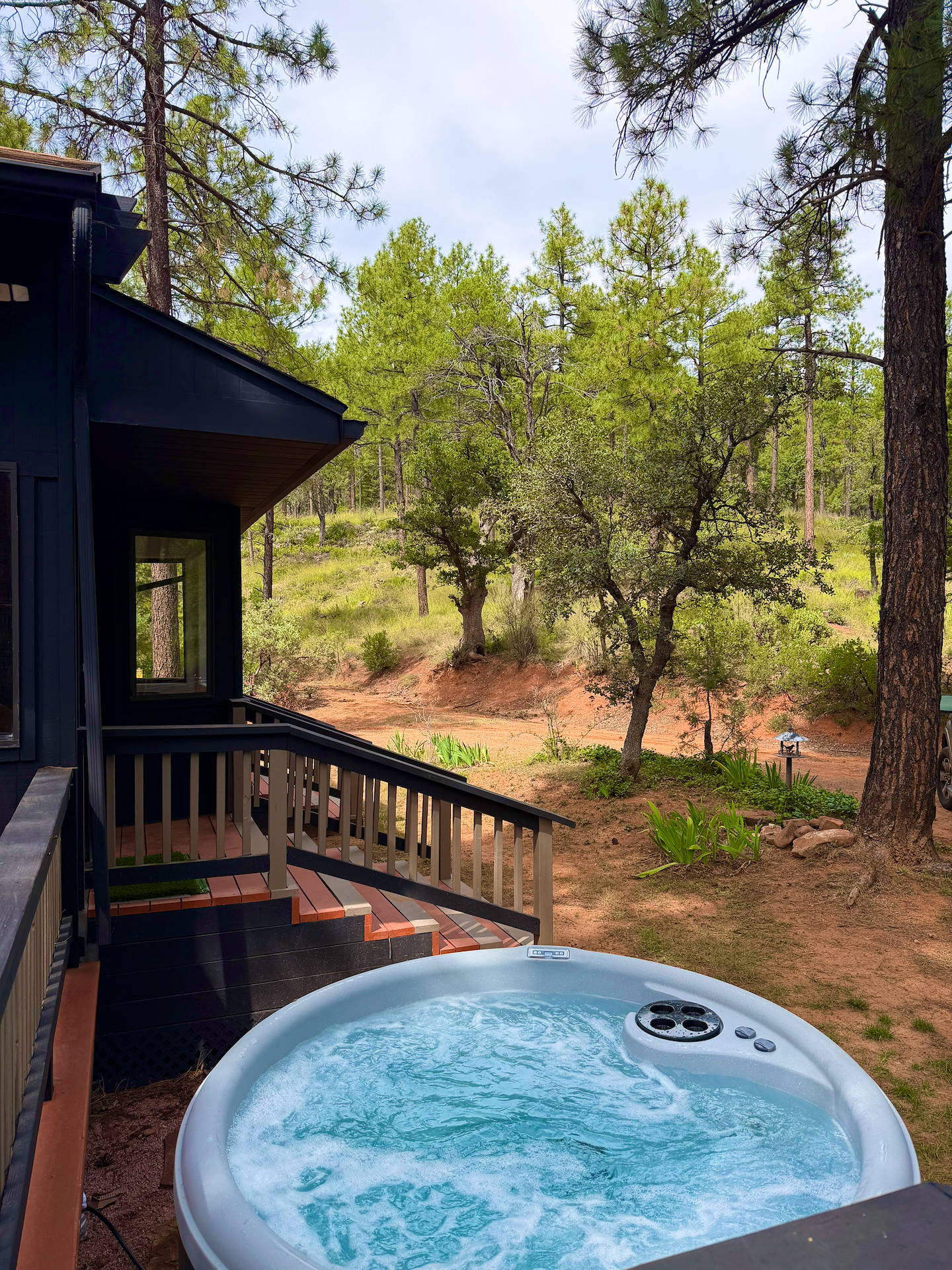 Private hot tub with peaceful forest views and a secluded cabin feel