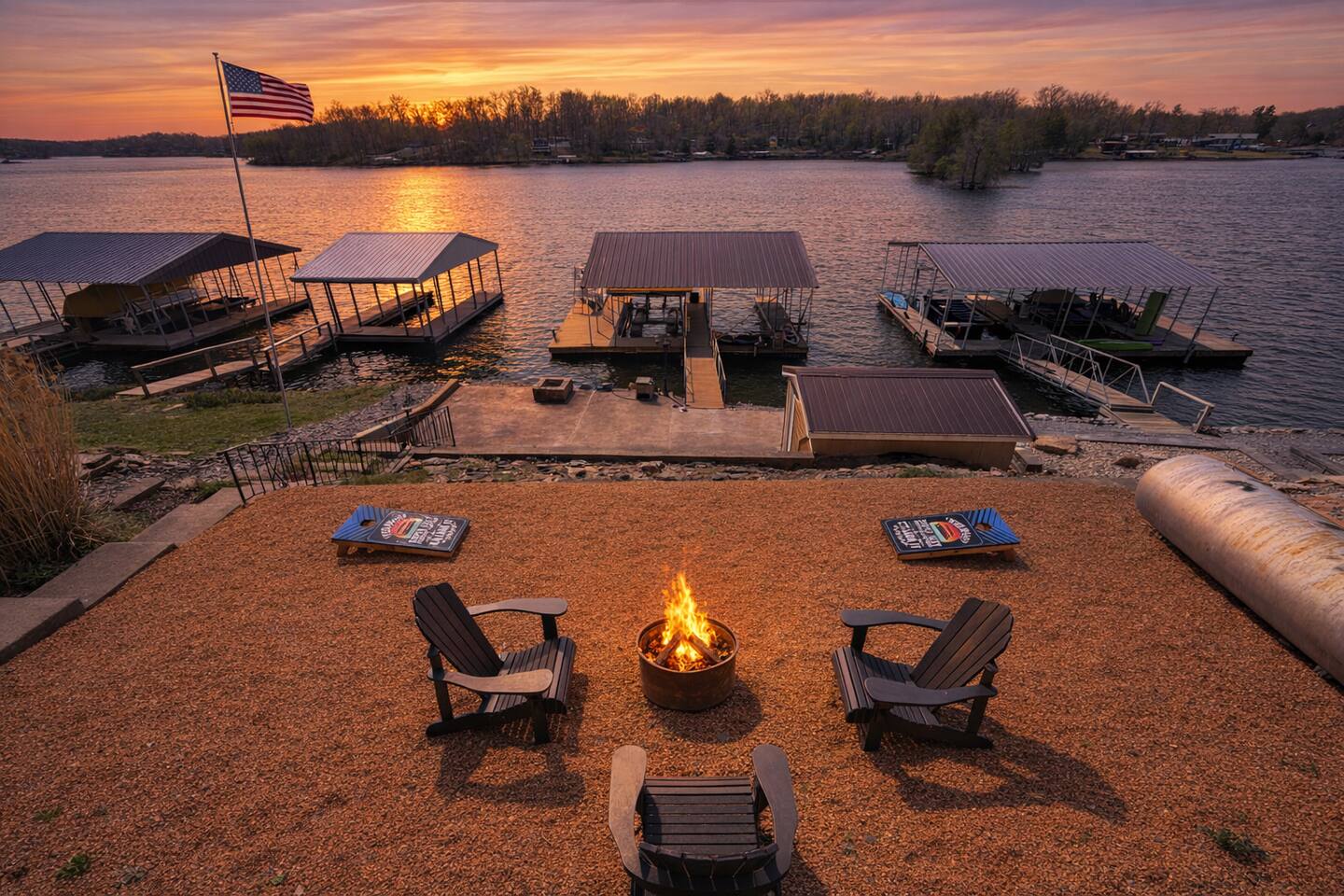 Sunset over the dock and lakeside fire pit