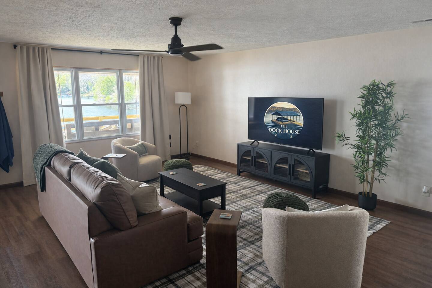 The Dock House open living room with lake views