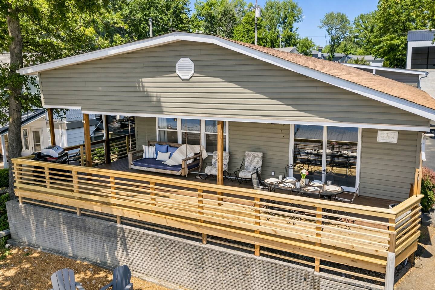 Lakeside deck with dining and grill