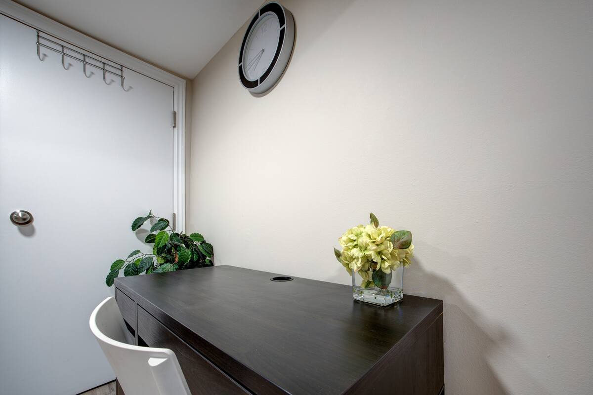 Calm, minimalist workspace with sleek desk—ideal for focus.