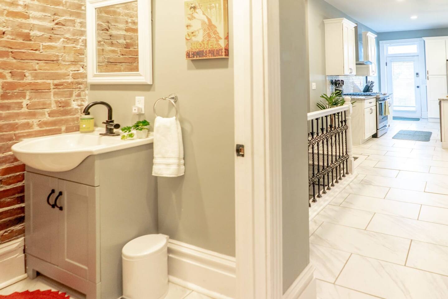 The handy half bath located off the kitchen