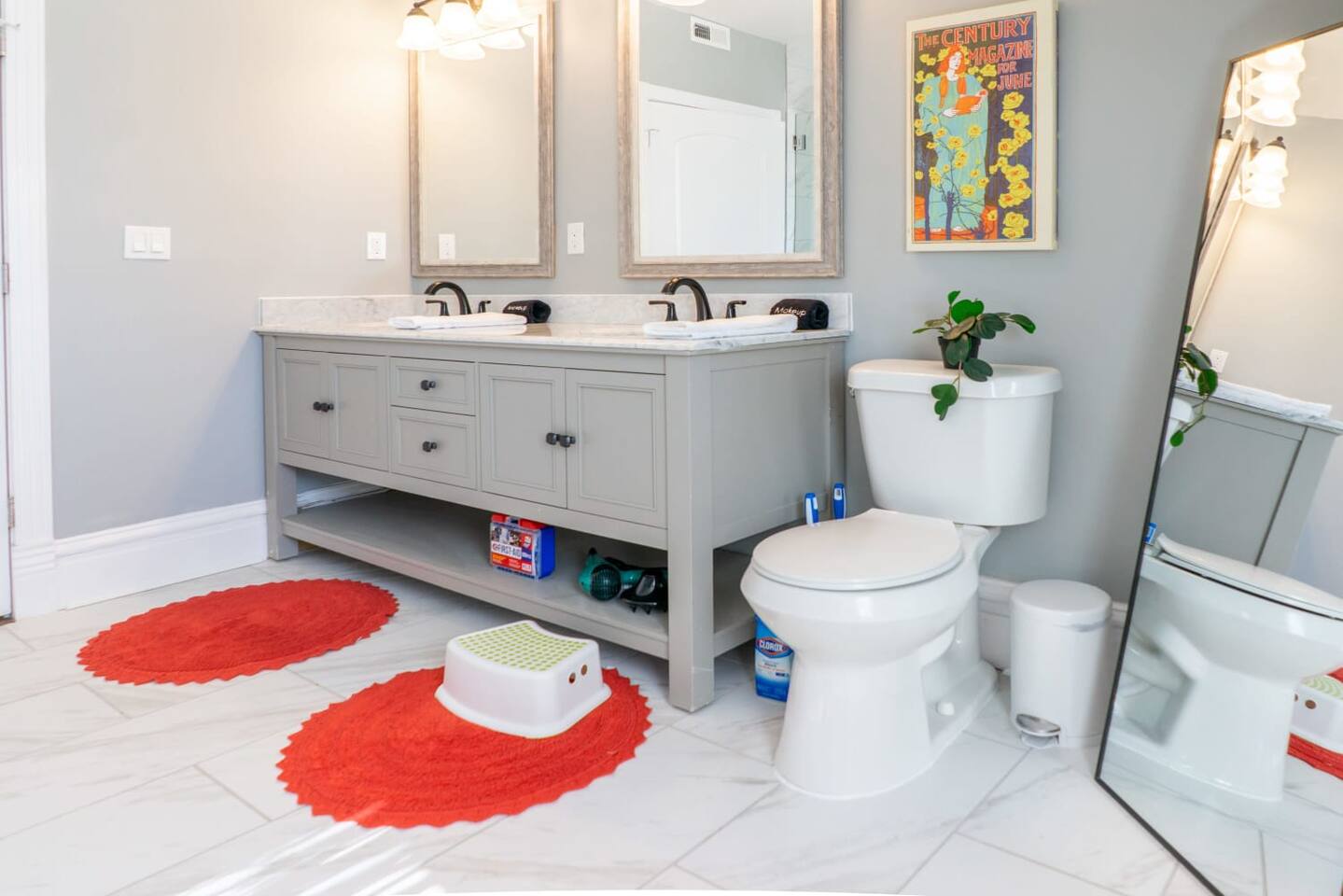 Kids can use the step to reach the dual sinks while they wash their hands and brush their teeth