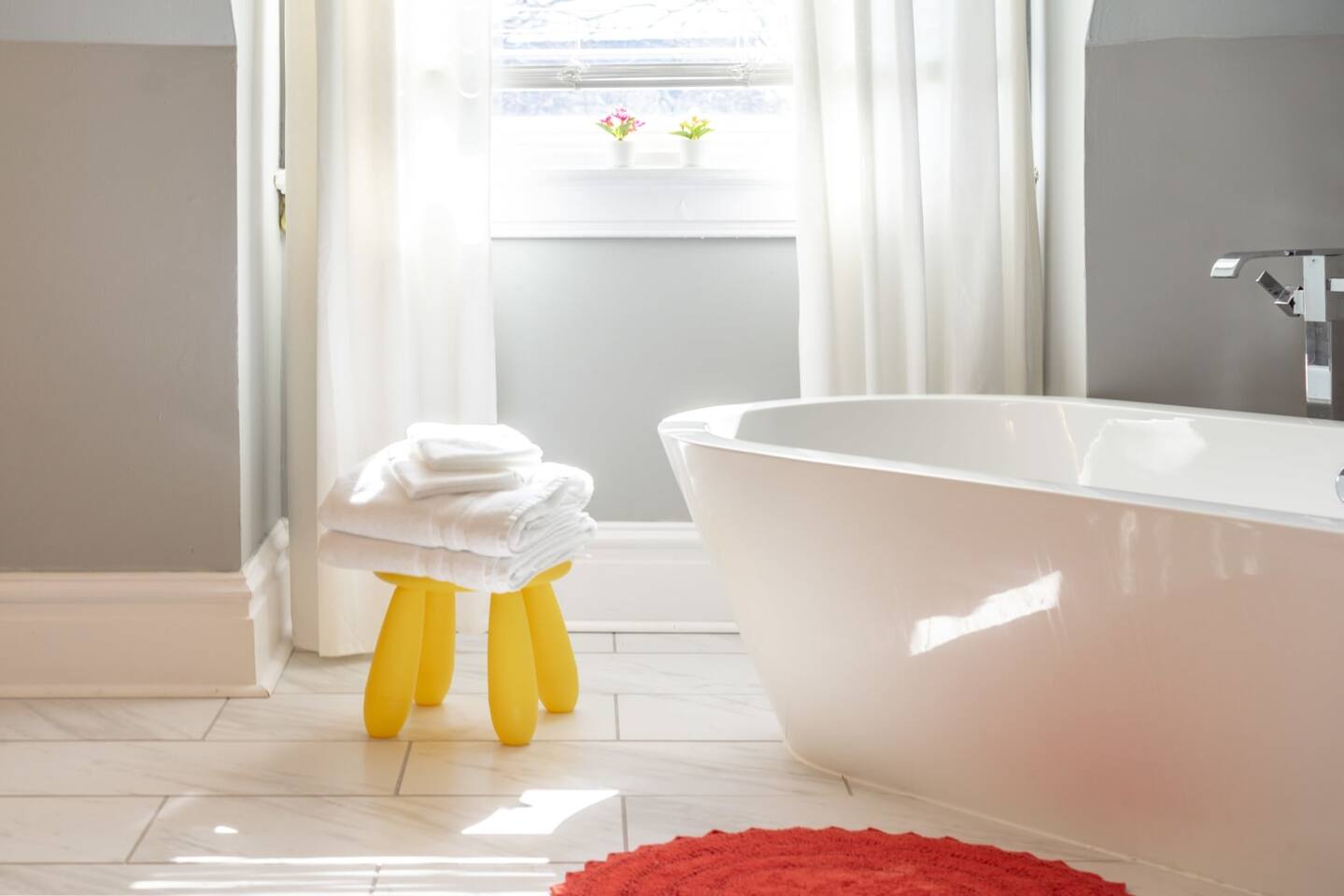 Each bathroom is stocked with soft fluffy towels for each guest