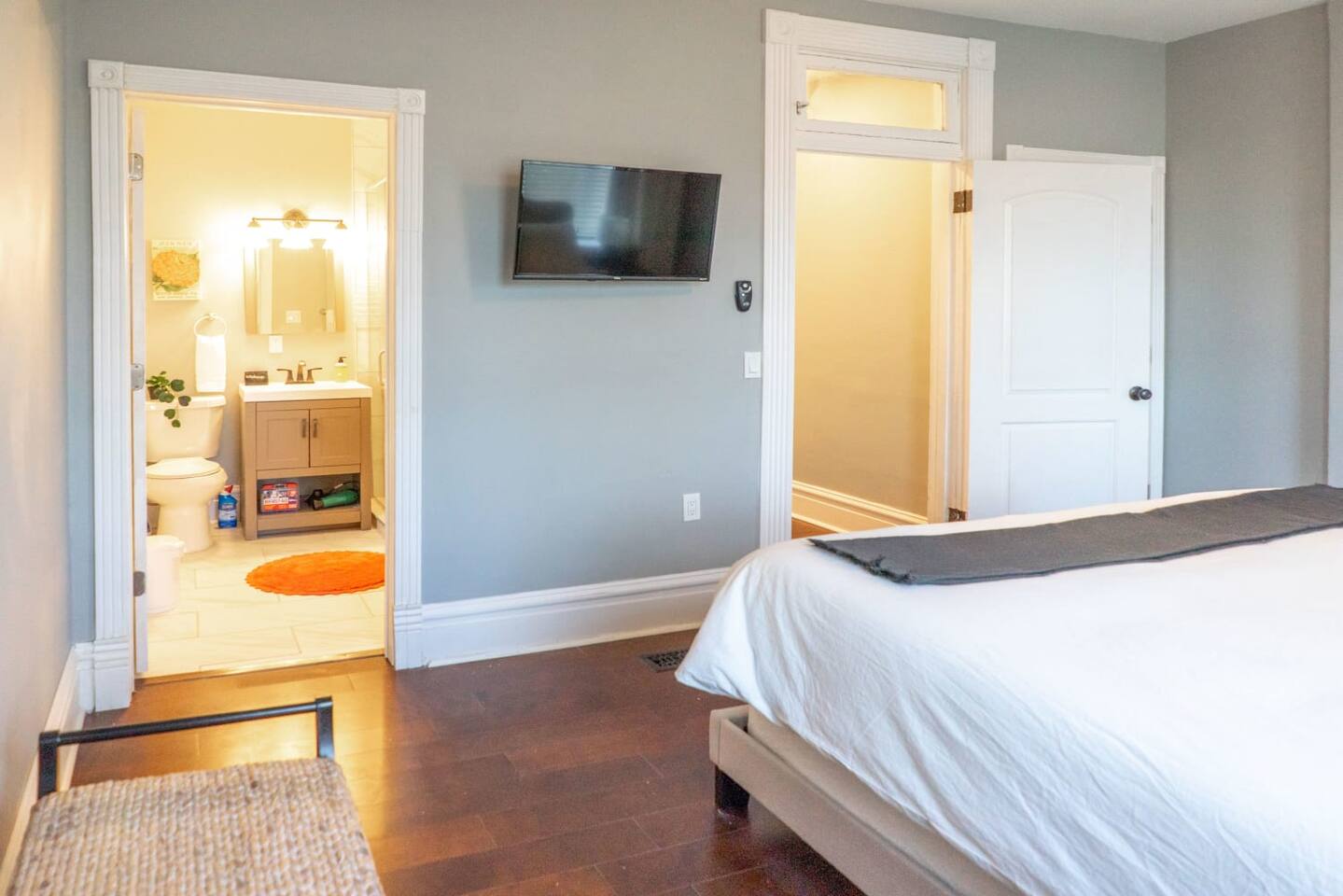 The master bedroom with a king bed, ensuite and Roku TV