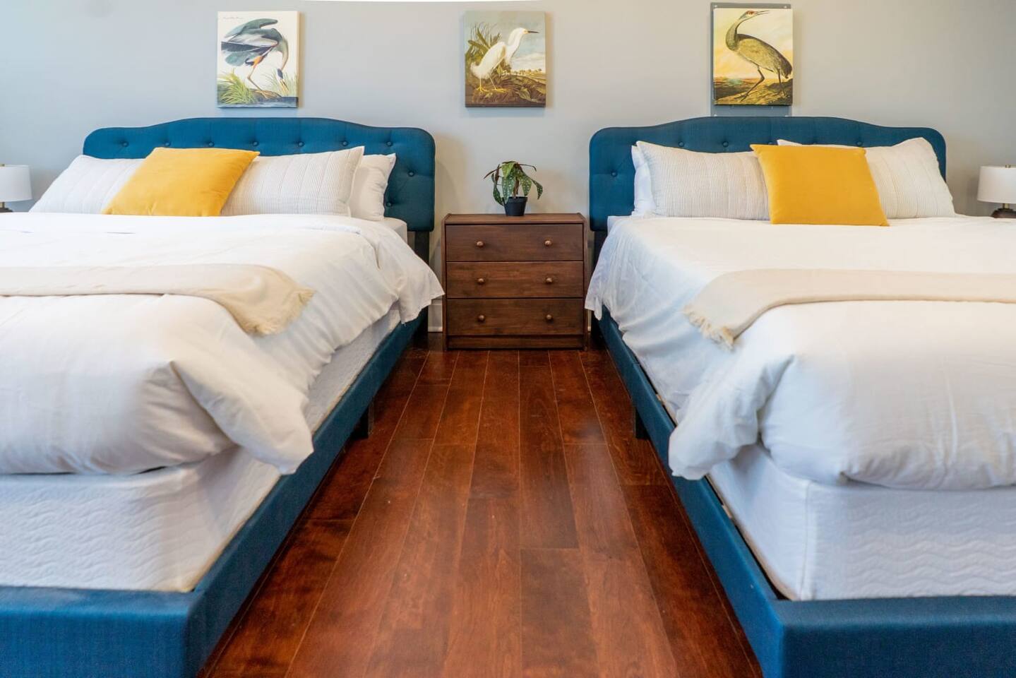 Nightstands and a small dresser give you plenty of space to unpack during your stay