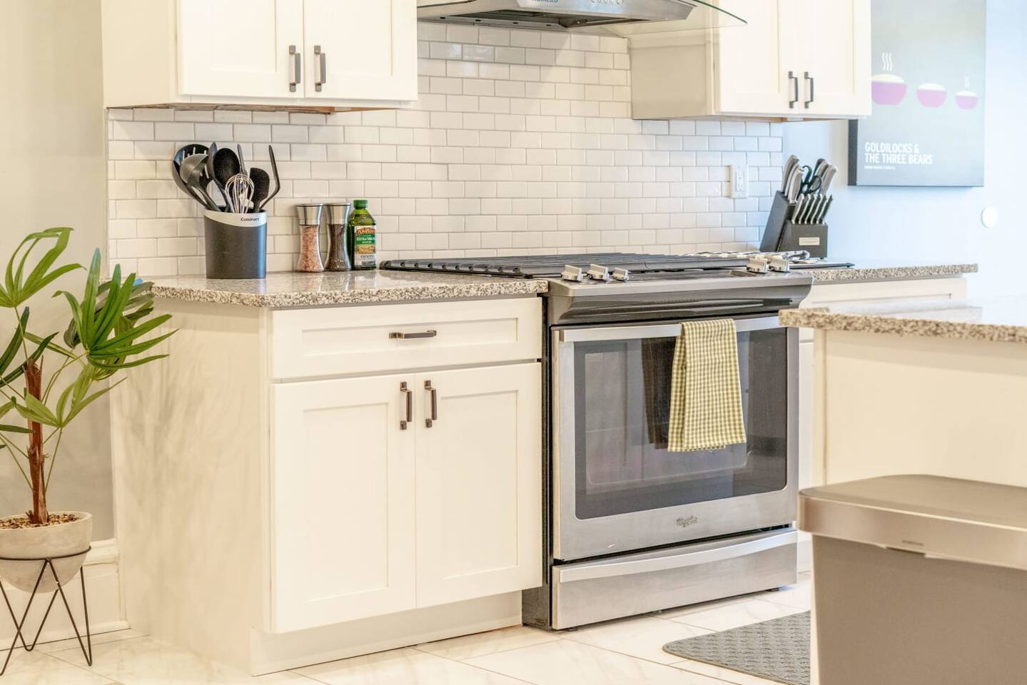 Stainless steel appliances add another high-end touch to this gorgeous kitchen