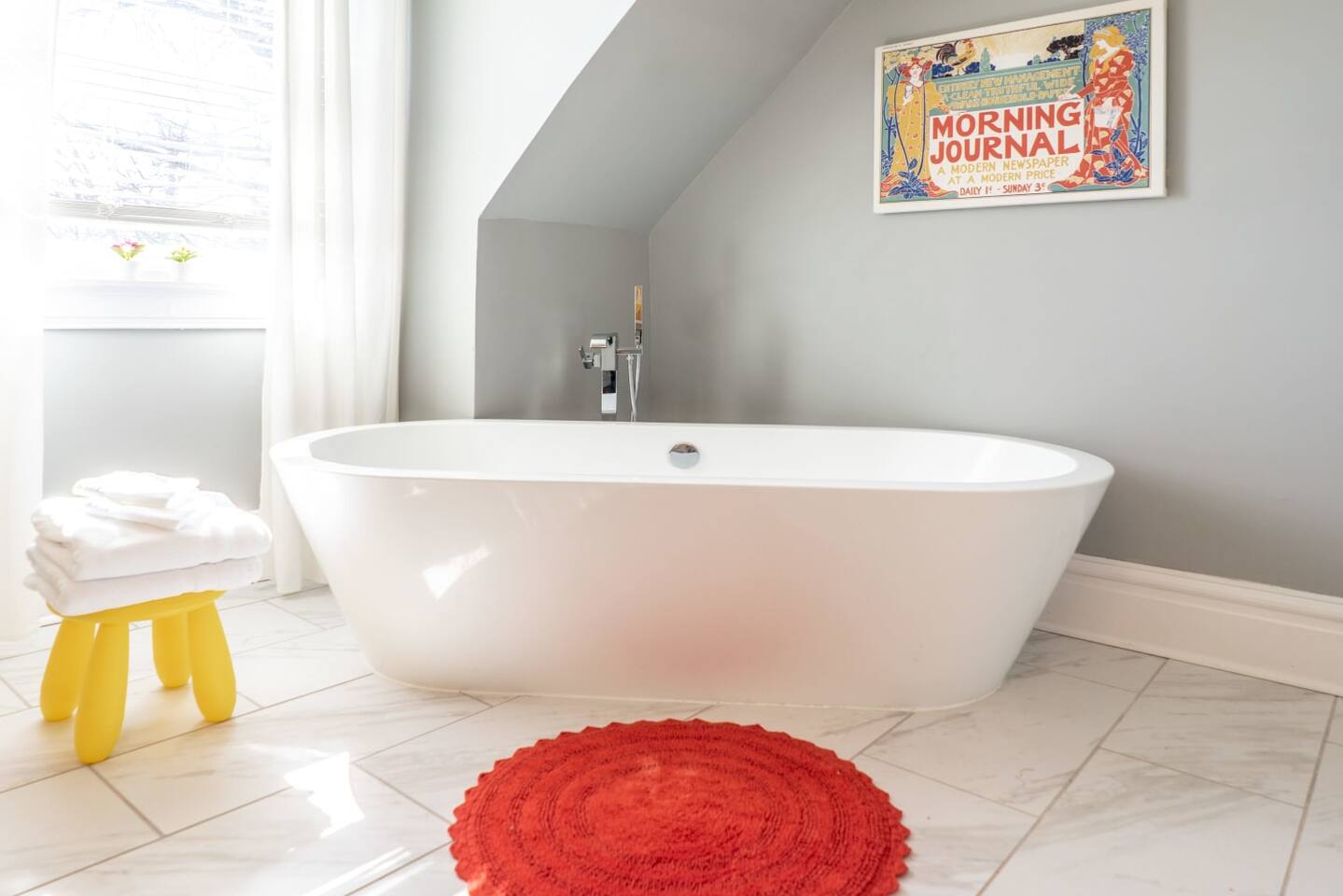 Beautiful corner-placed soaking tub in this light-filled bathroom. It’s the perfect way to relax and unwind.