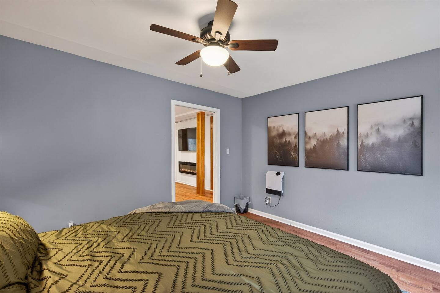 Comfortable sleeping for 2 in the King size downstairs room with ceiling fan.