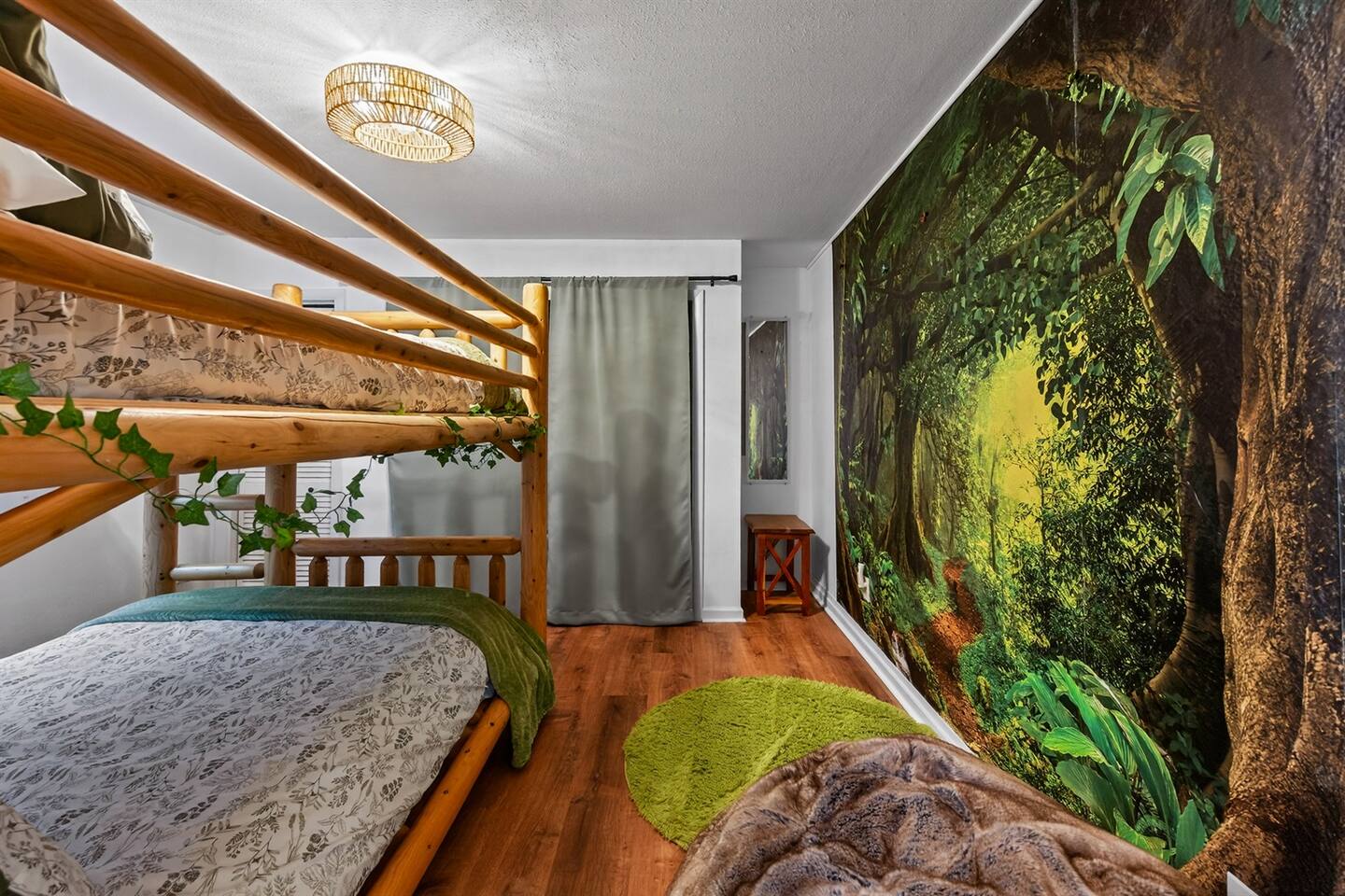 The kids will love the enchantment in their own bunk room forest.