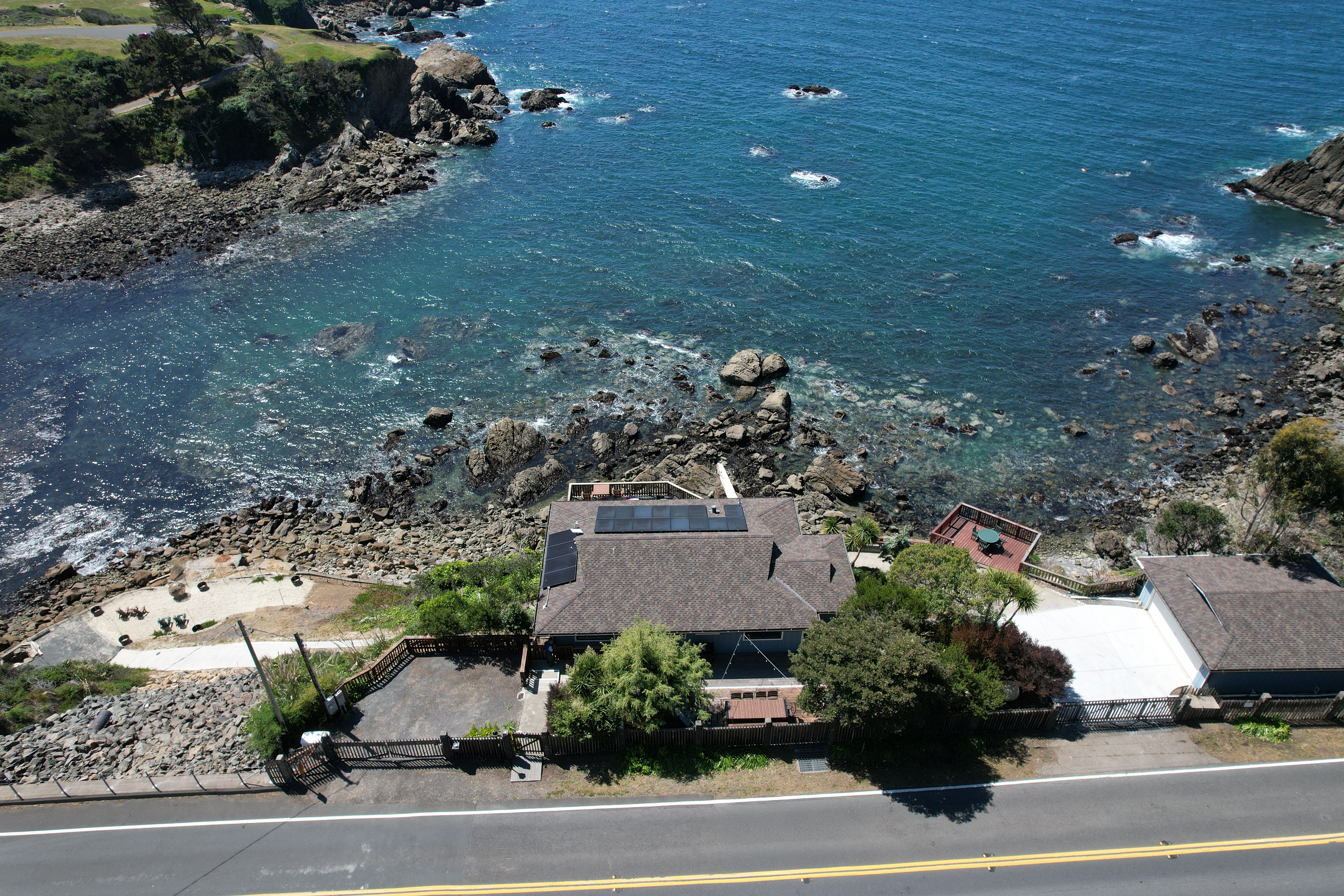 Oceanfront retreat with hot tub, private shore access & epic views