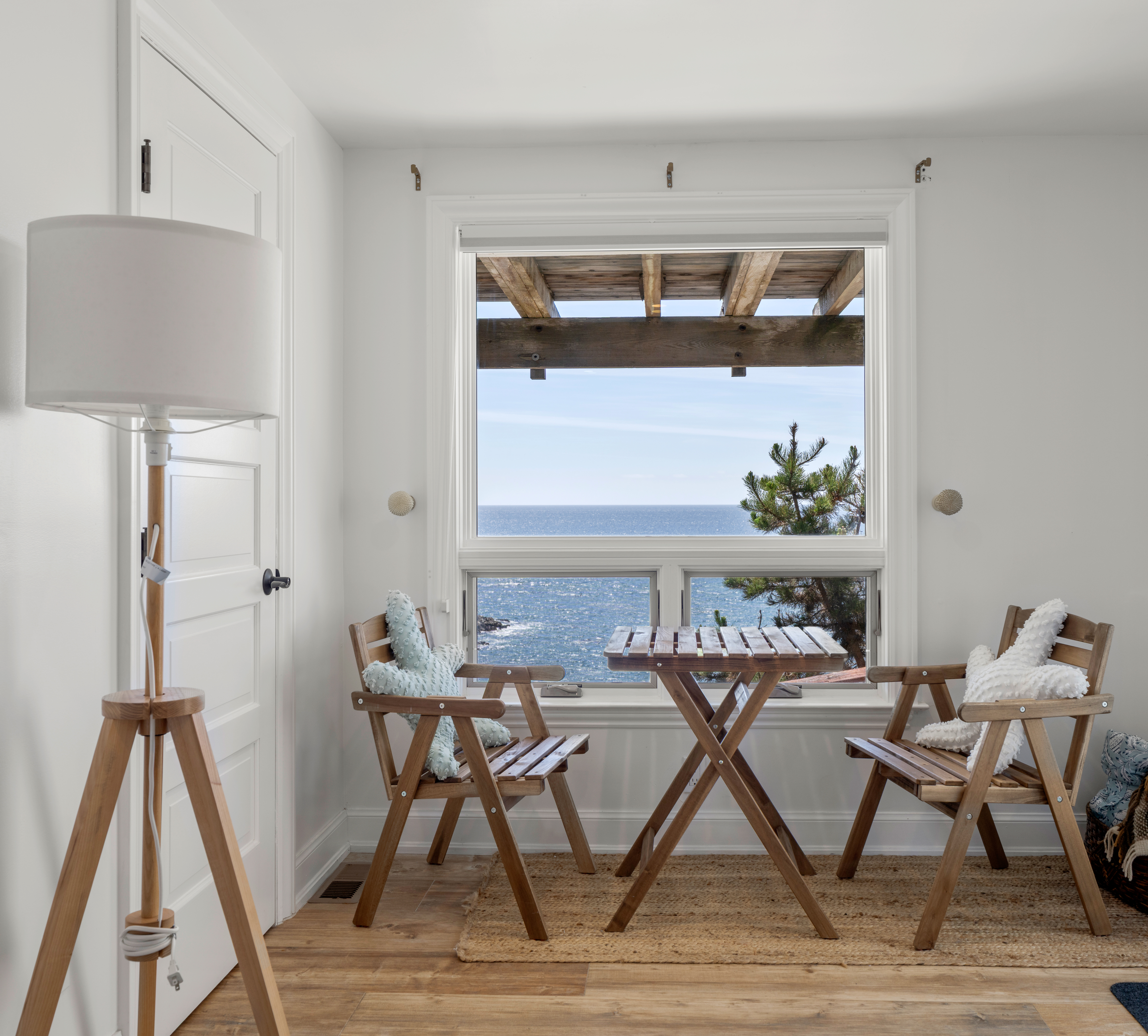 Cozy window nook with ocean views—perfect for coffee and sunsets