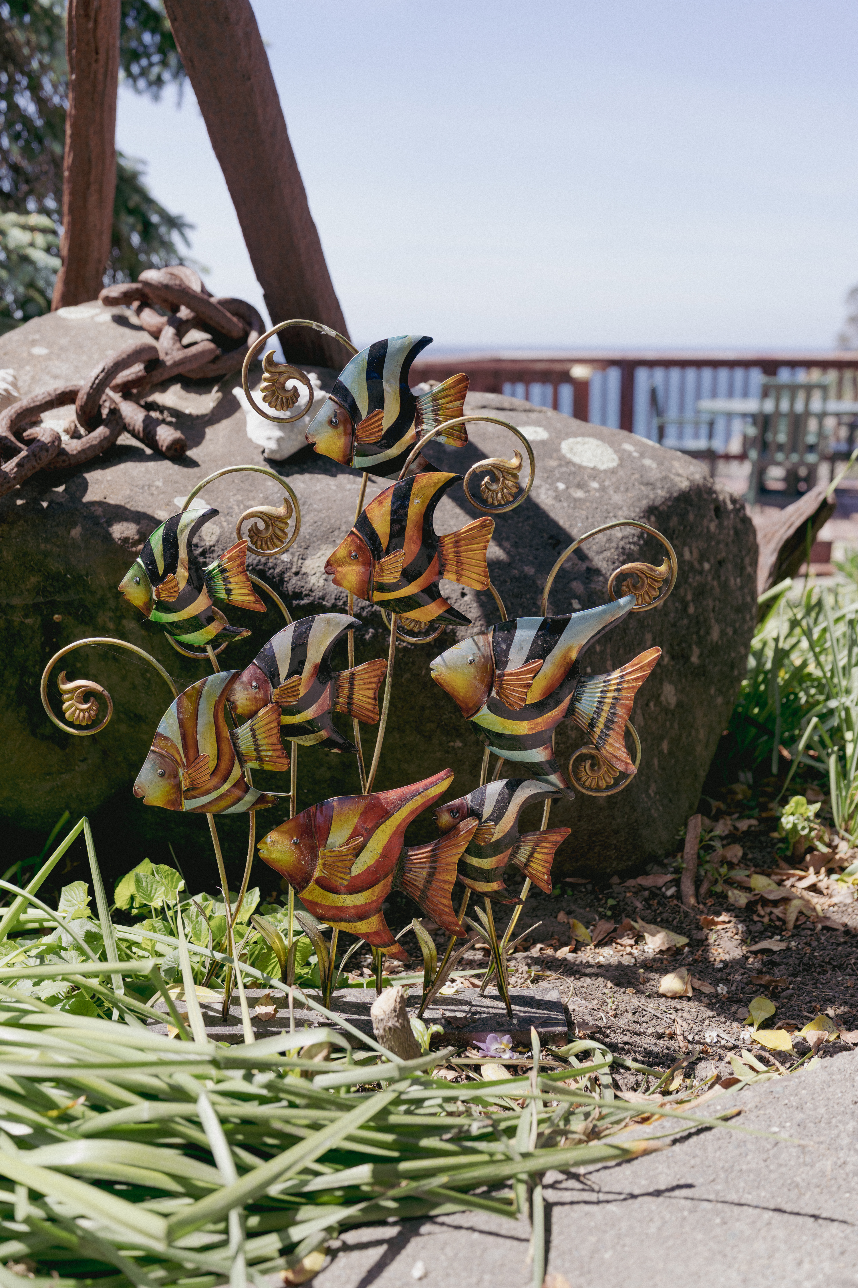 Coastal garden charm with ocean-view deck and artful details