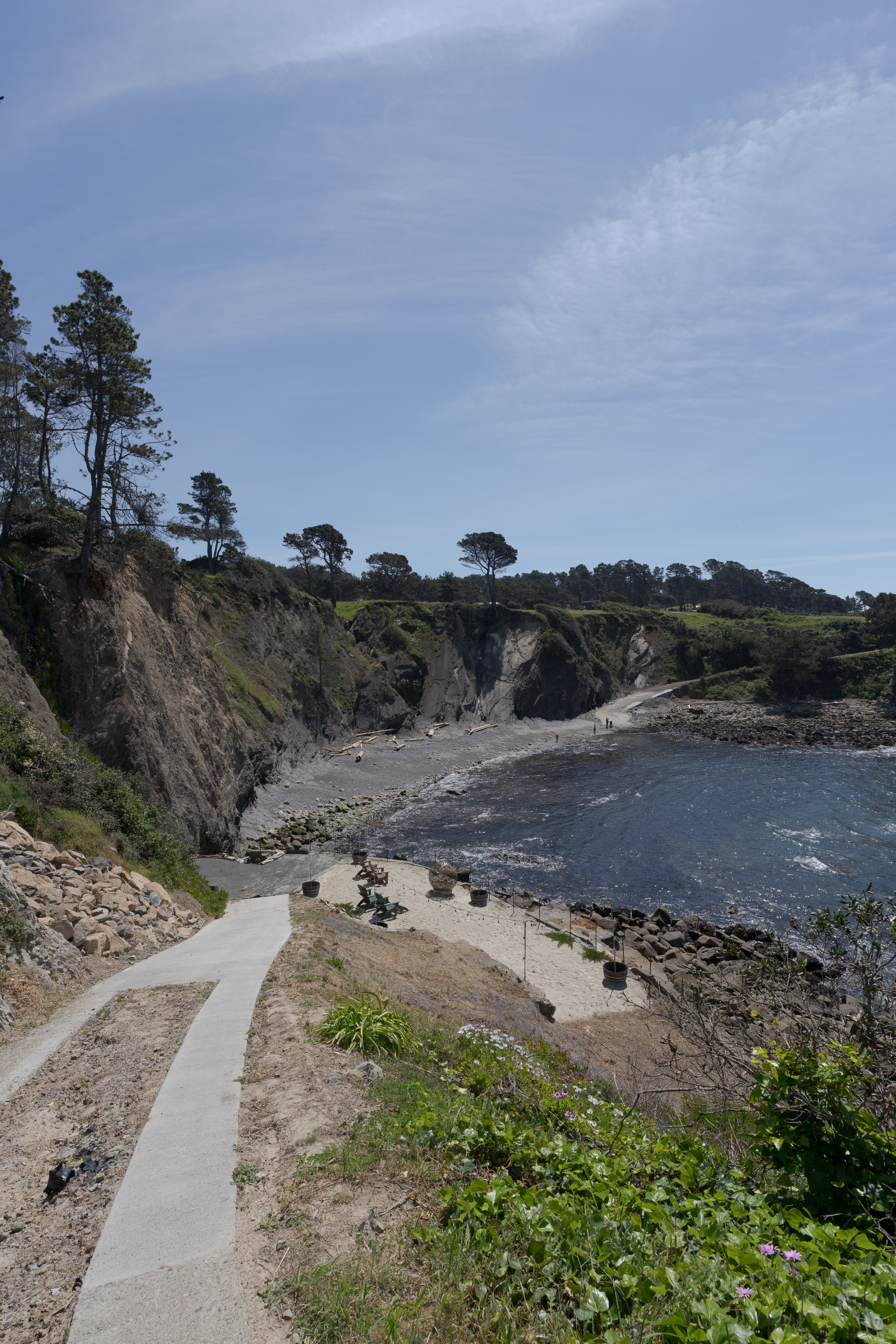 Clifftop path to secluded cove—waves, tide pools, and sunsets.