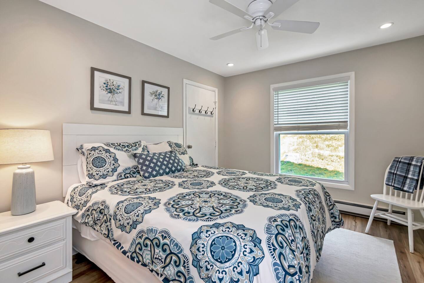 Guest room with queen bed and attached bath