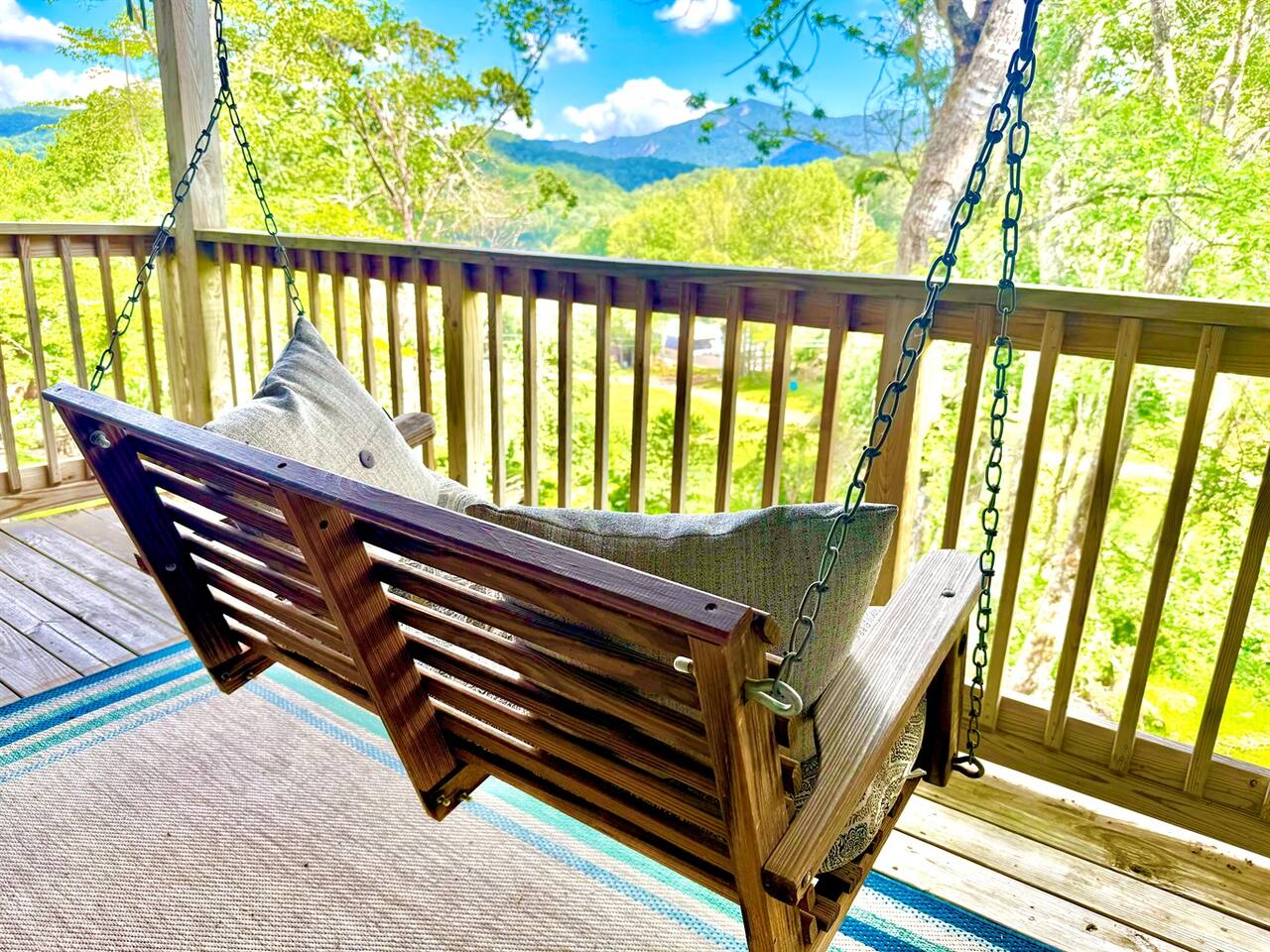 Outdoor patio swing over the stream