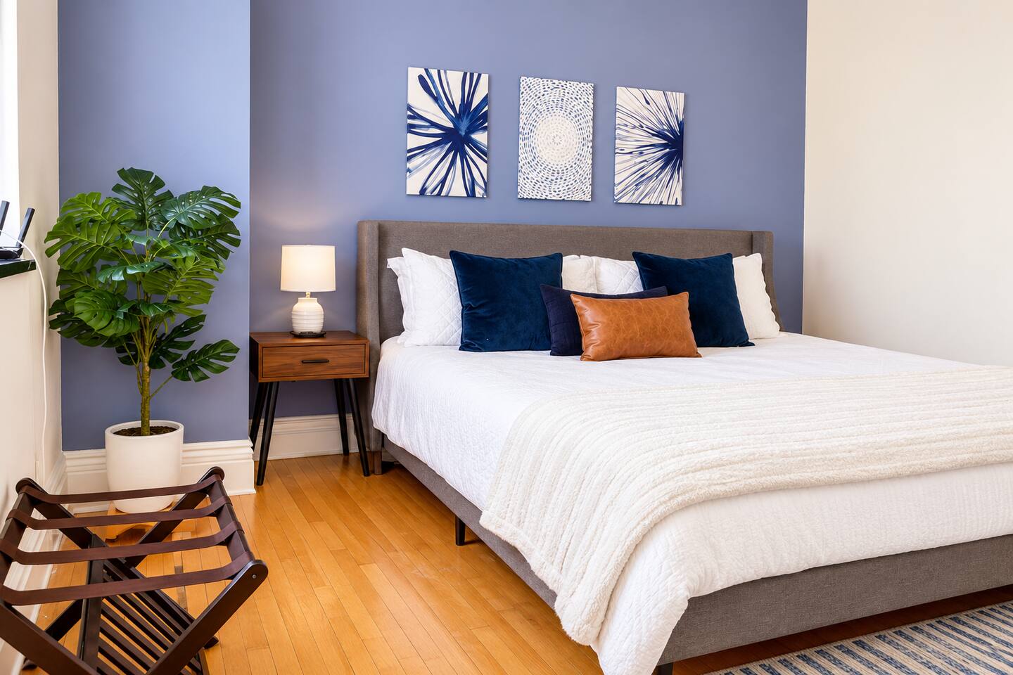 A king bed for real rest, with a luggage rack so you can live out of your suitcase without the mess.
