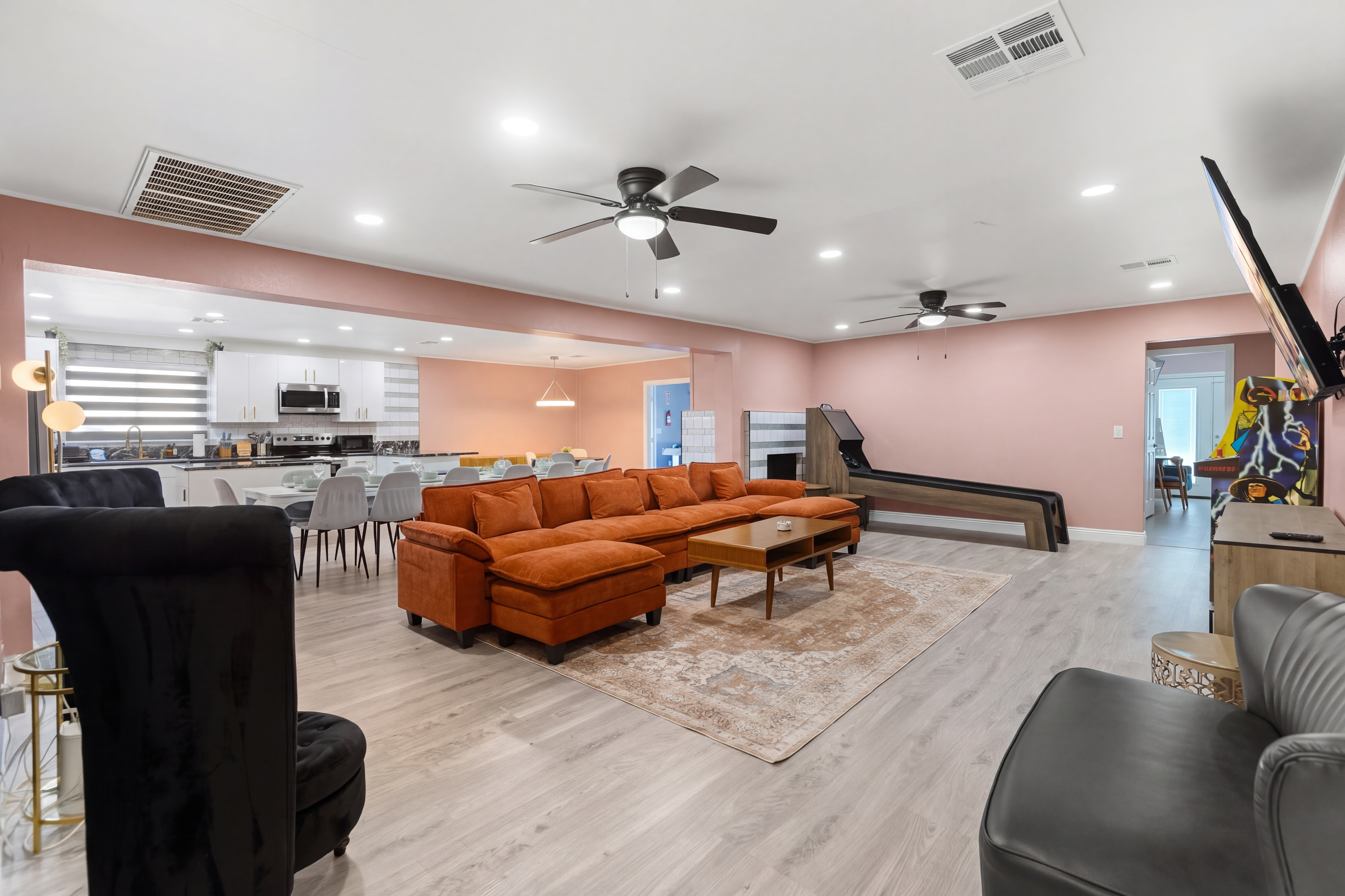 Spacious open living area with games and large sectional