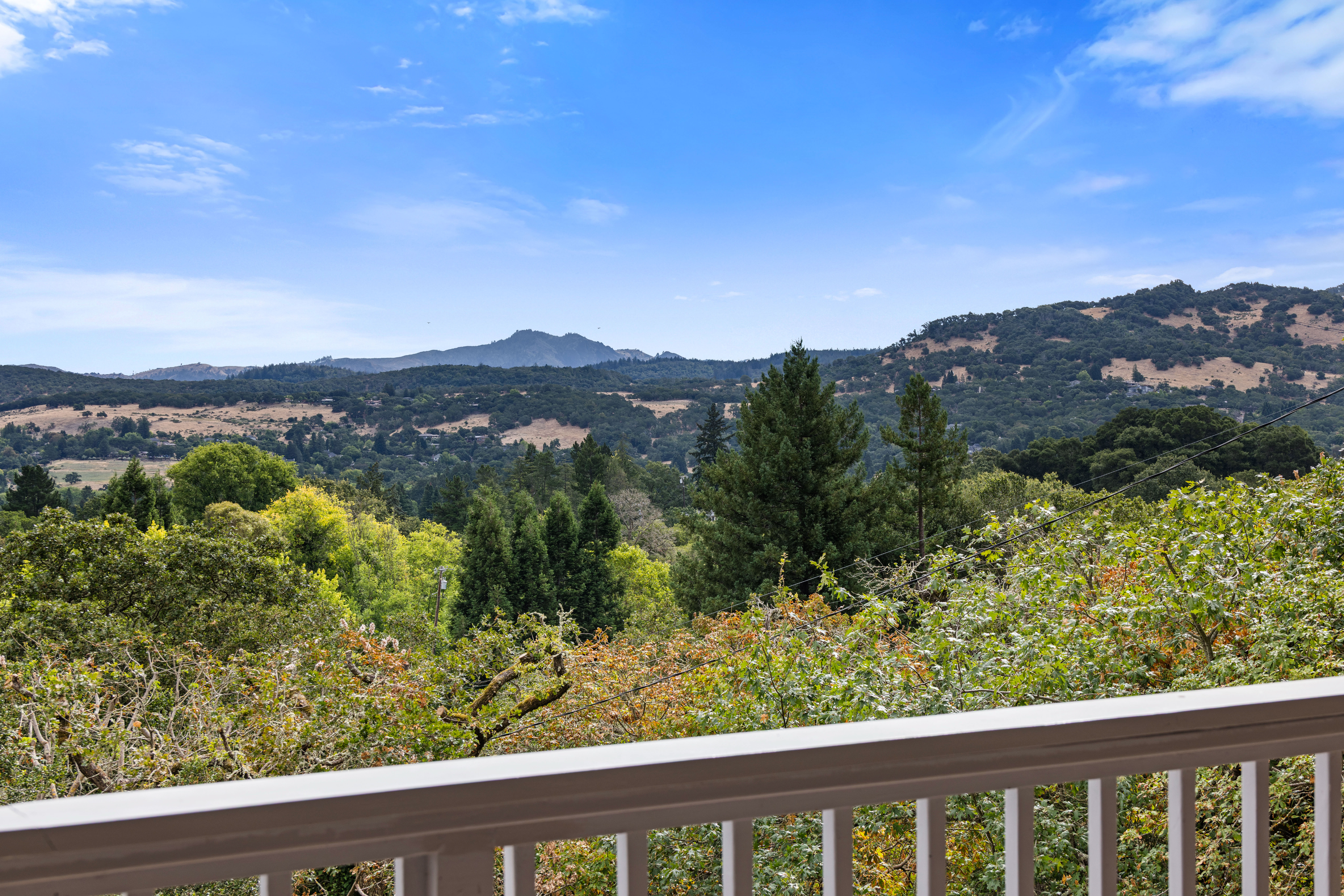 Private balcony with sweeping hill and mountain views