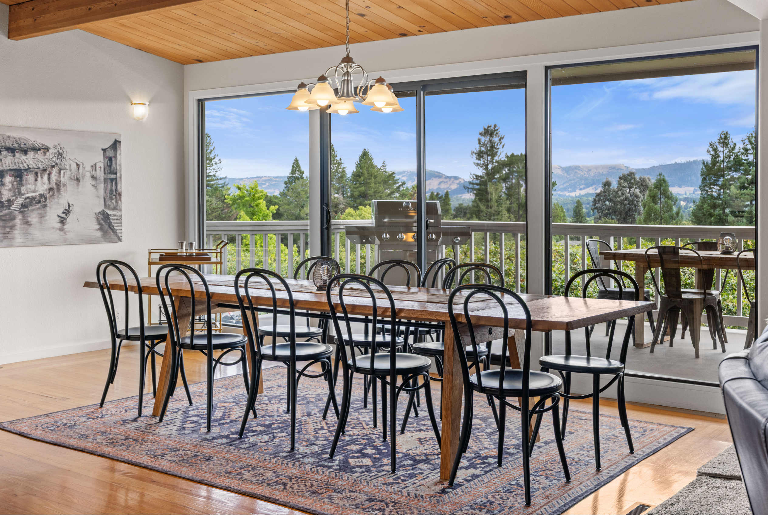 Spacious dining room with deck access and stunning mountain views