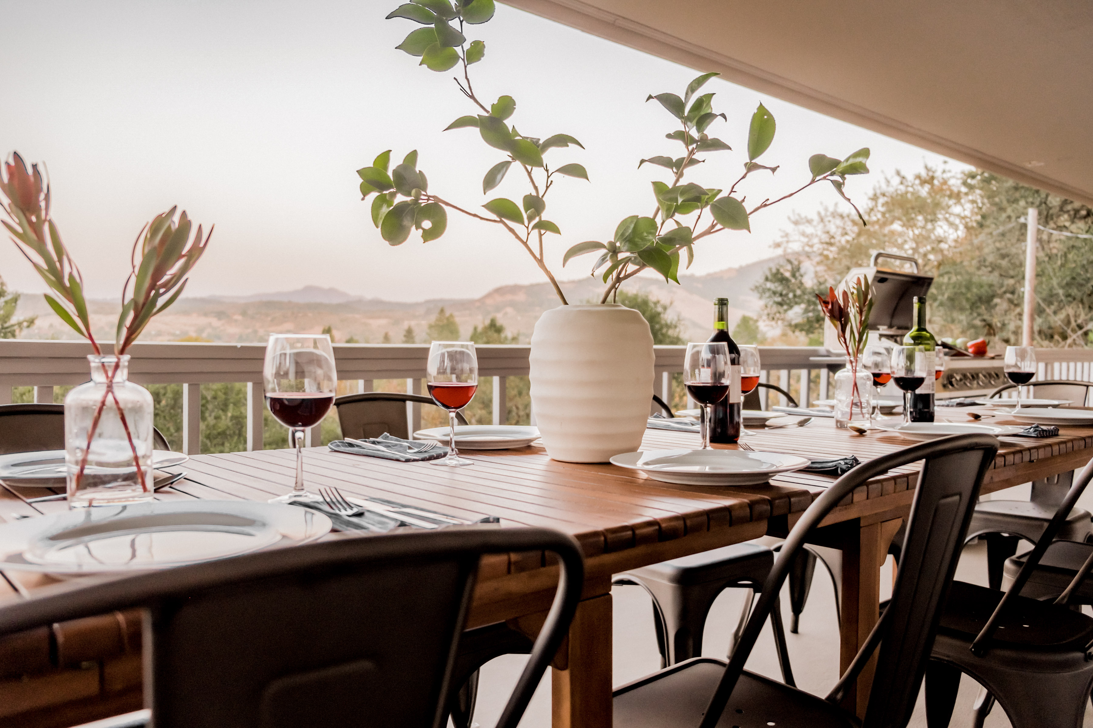 Covered patio dining with scenic views—perfect for sunset meals and wine