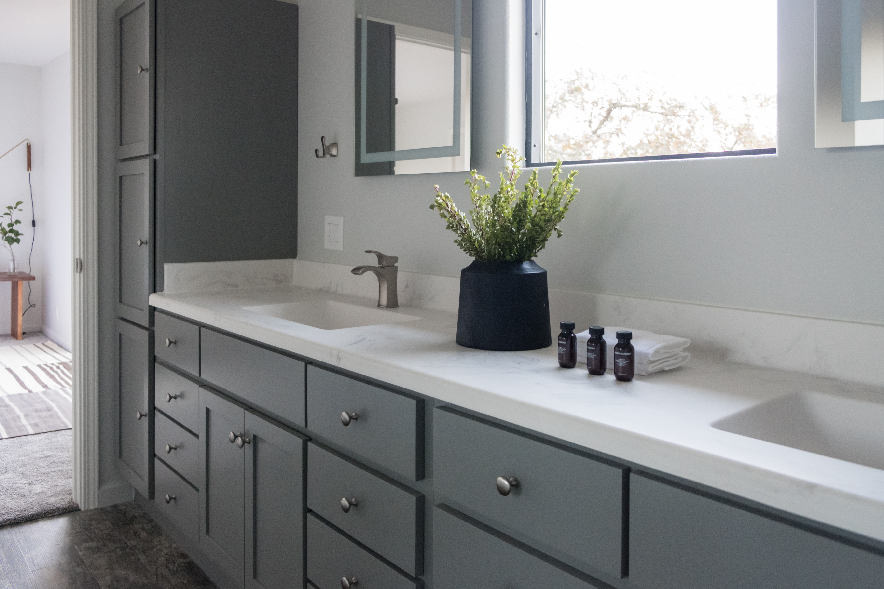 Bright double-vanity bathroom with spa-like style and natural light