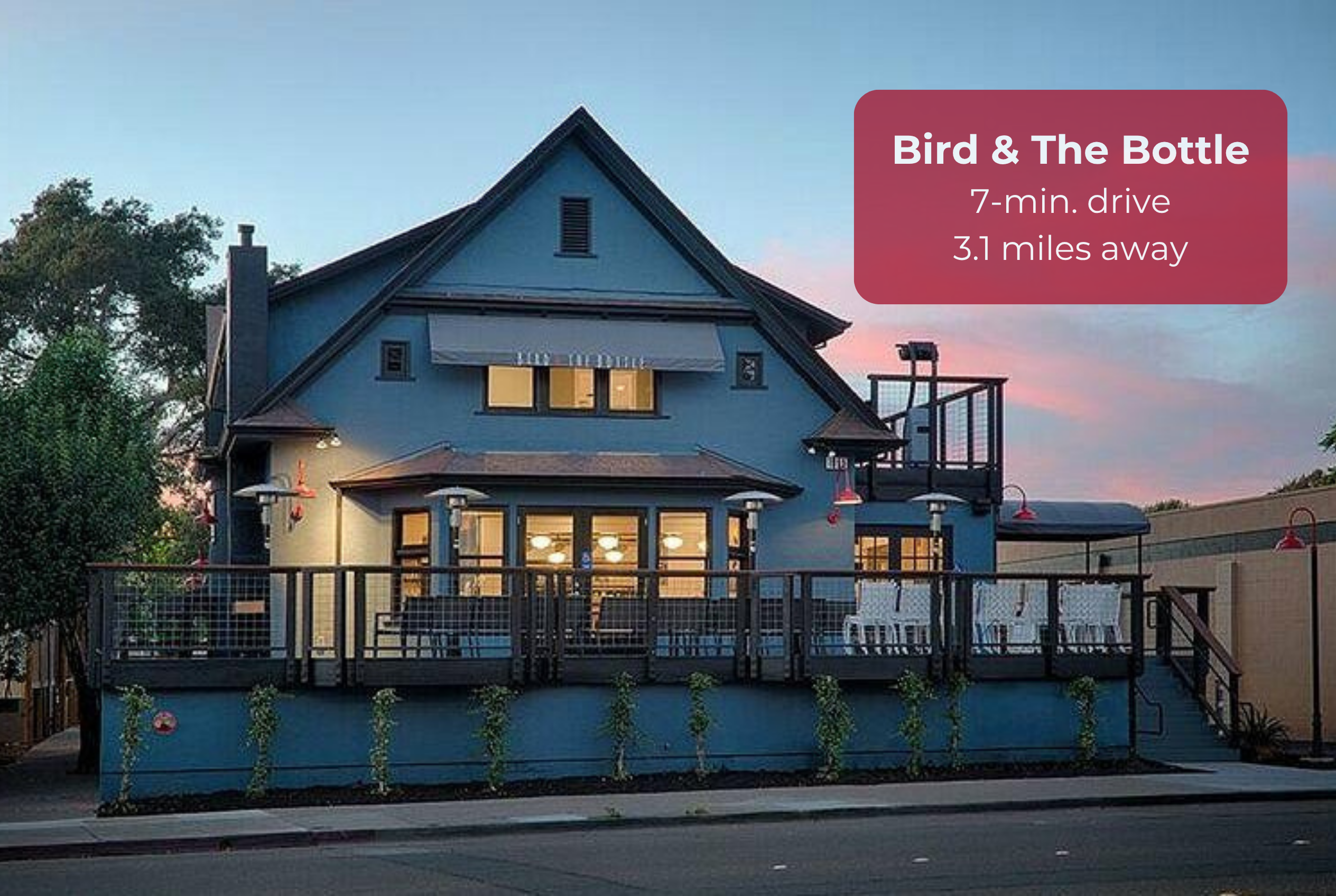 Charming home with a spacious deck and warm evening curb appeal