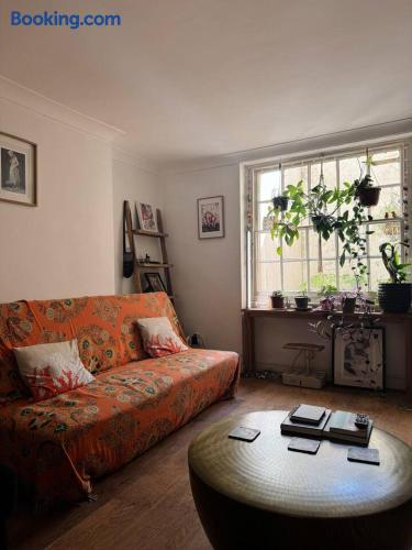 Lush Garden Flat — 30 Secs to the Sea - Holiday Home