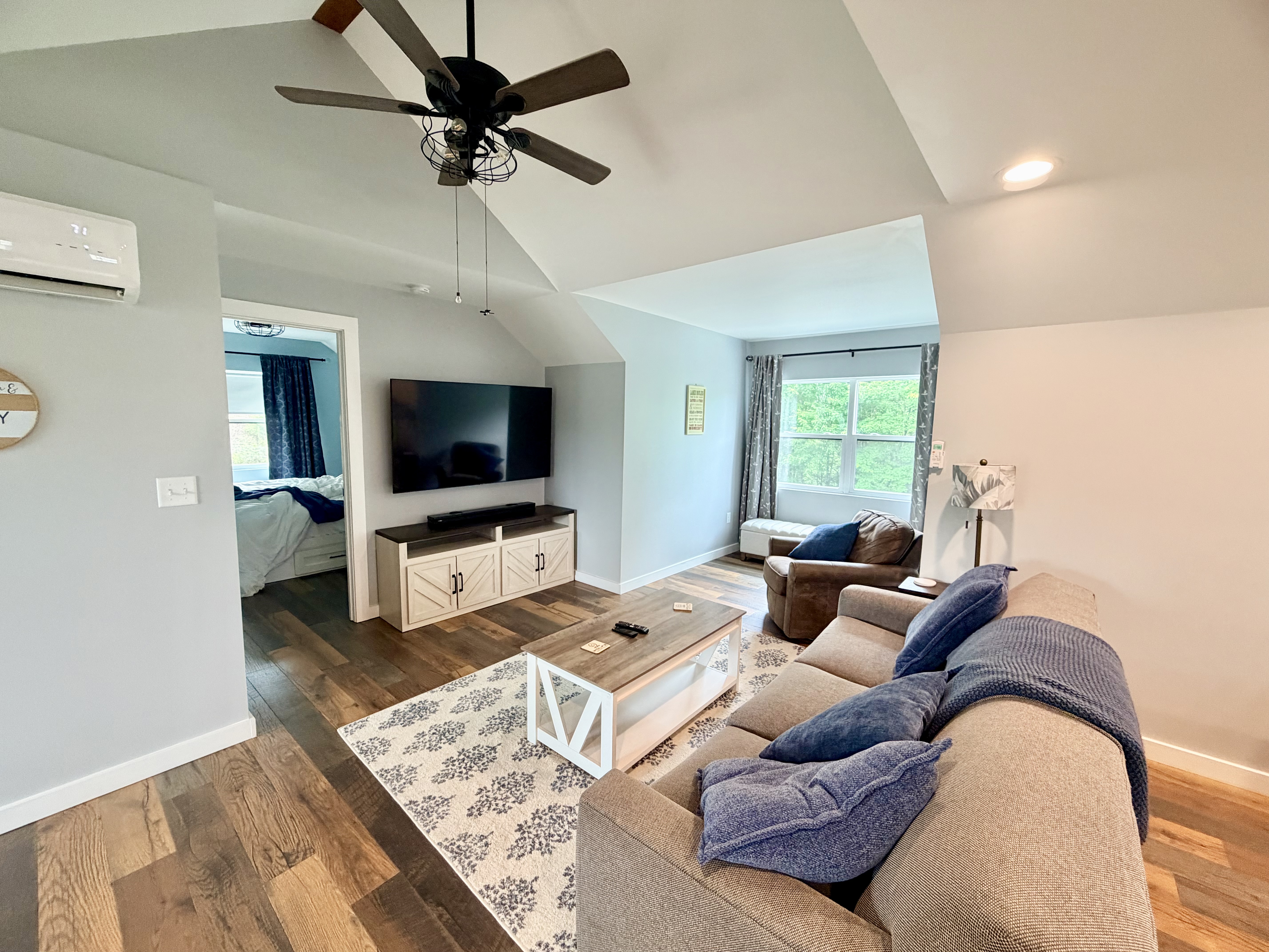Loft-style living room with big-screen TV