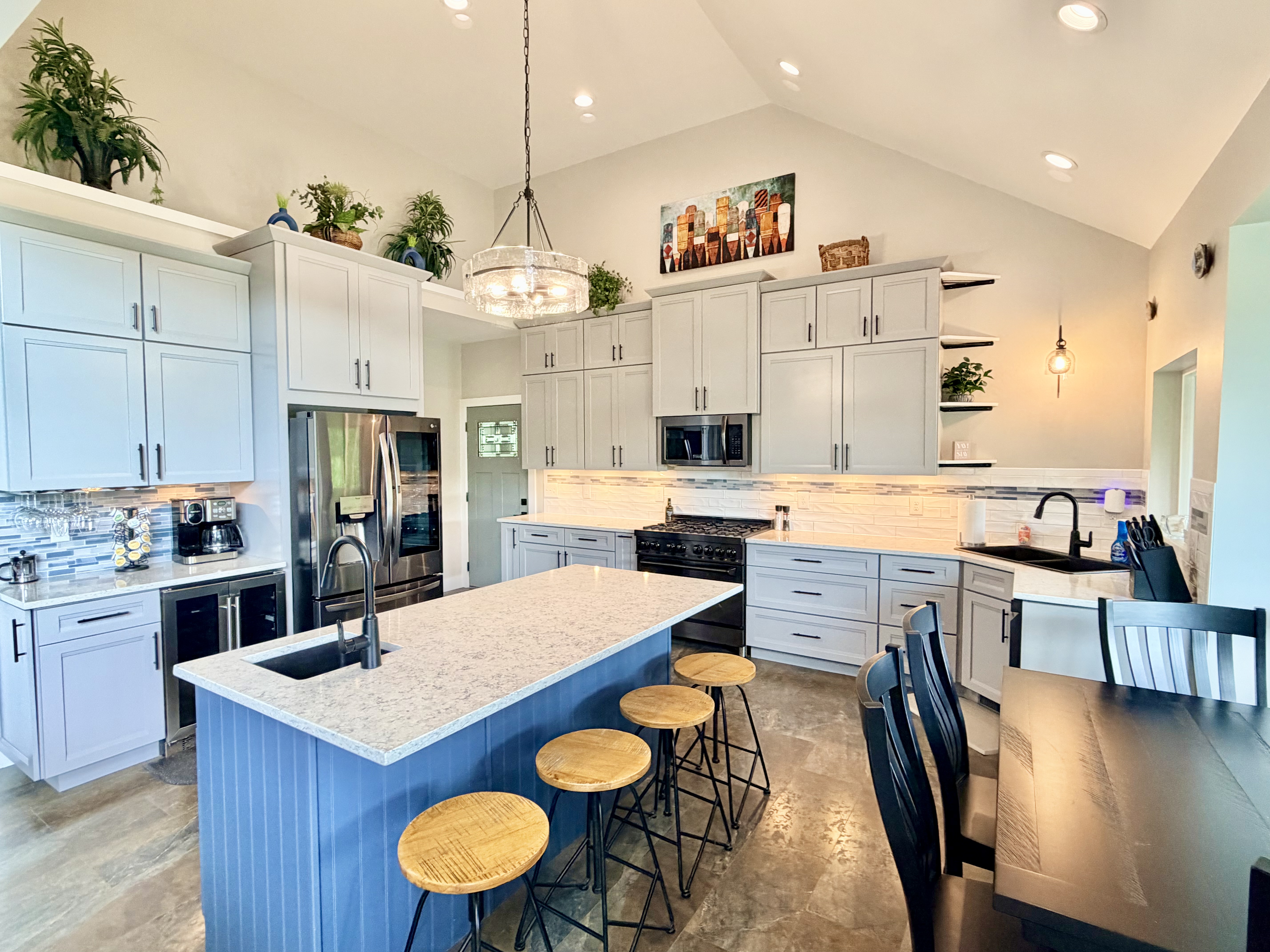 Bright gourmet kitchen with large island