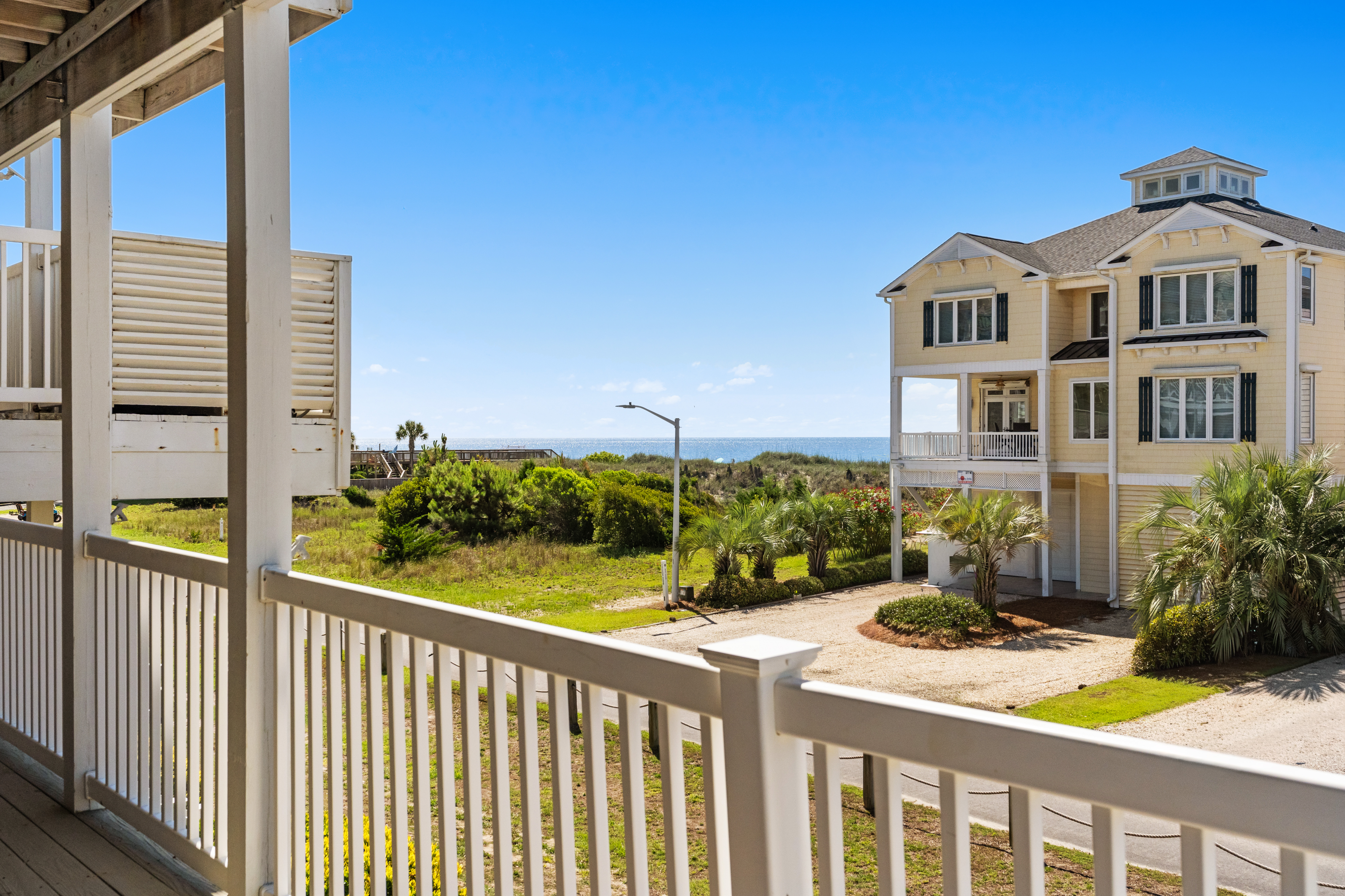 Castaway the Day – Second Row – closest walk to beach access, pool, and tiki bar!