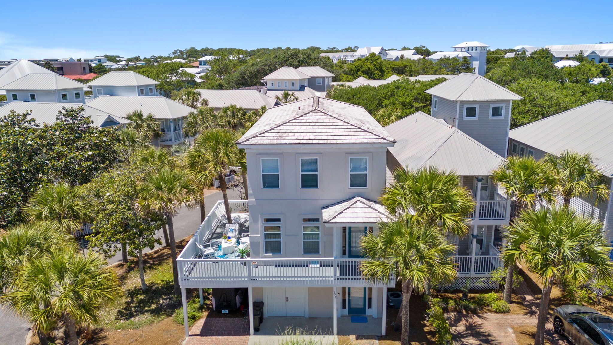 Aerial view of the home nestled in this beautiful neighborhood.