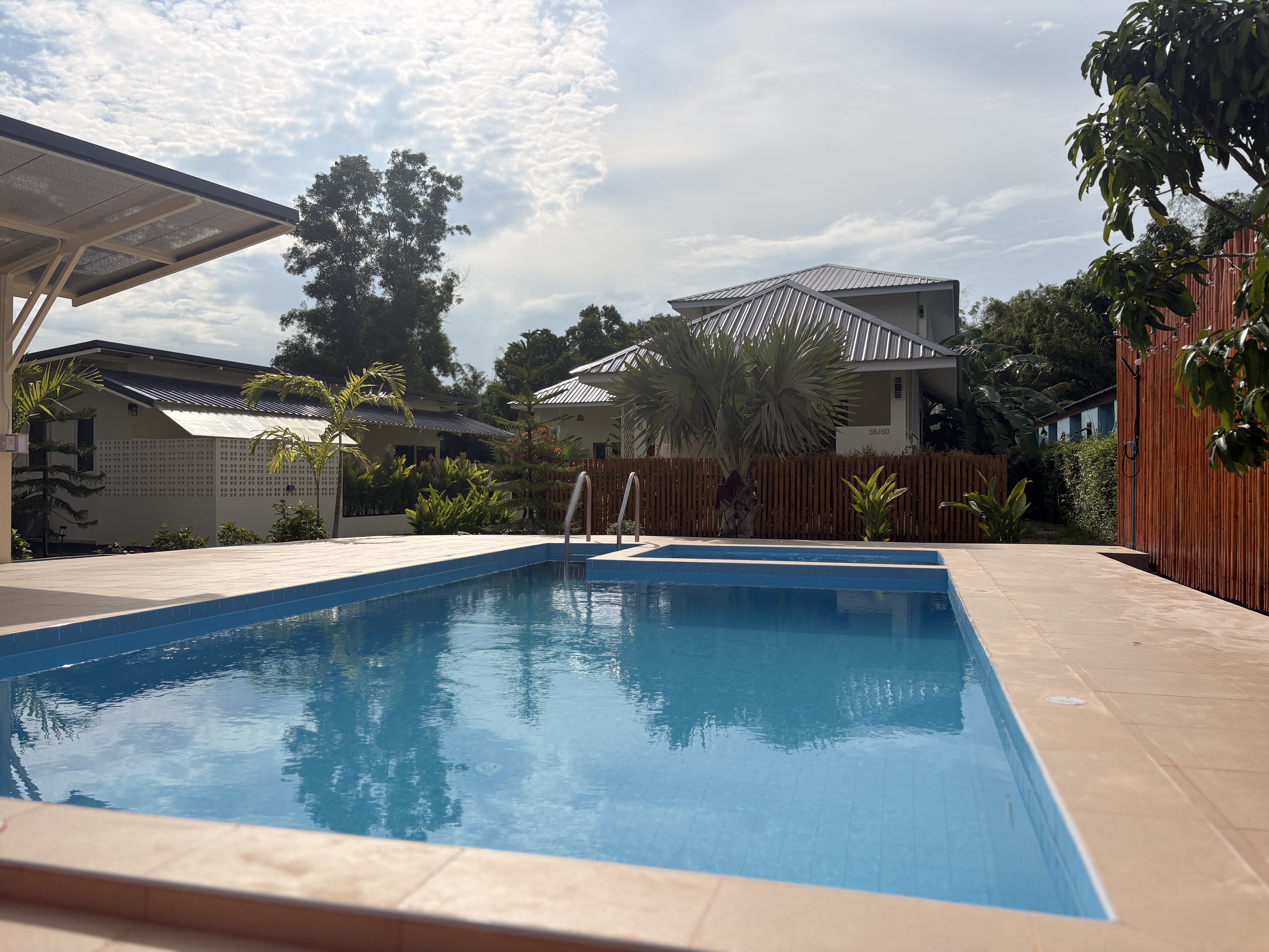Private tropical pool with spacious deck and serene resort-style vibes