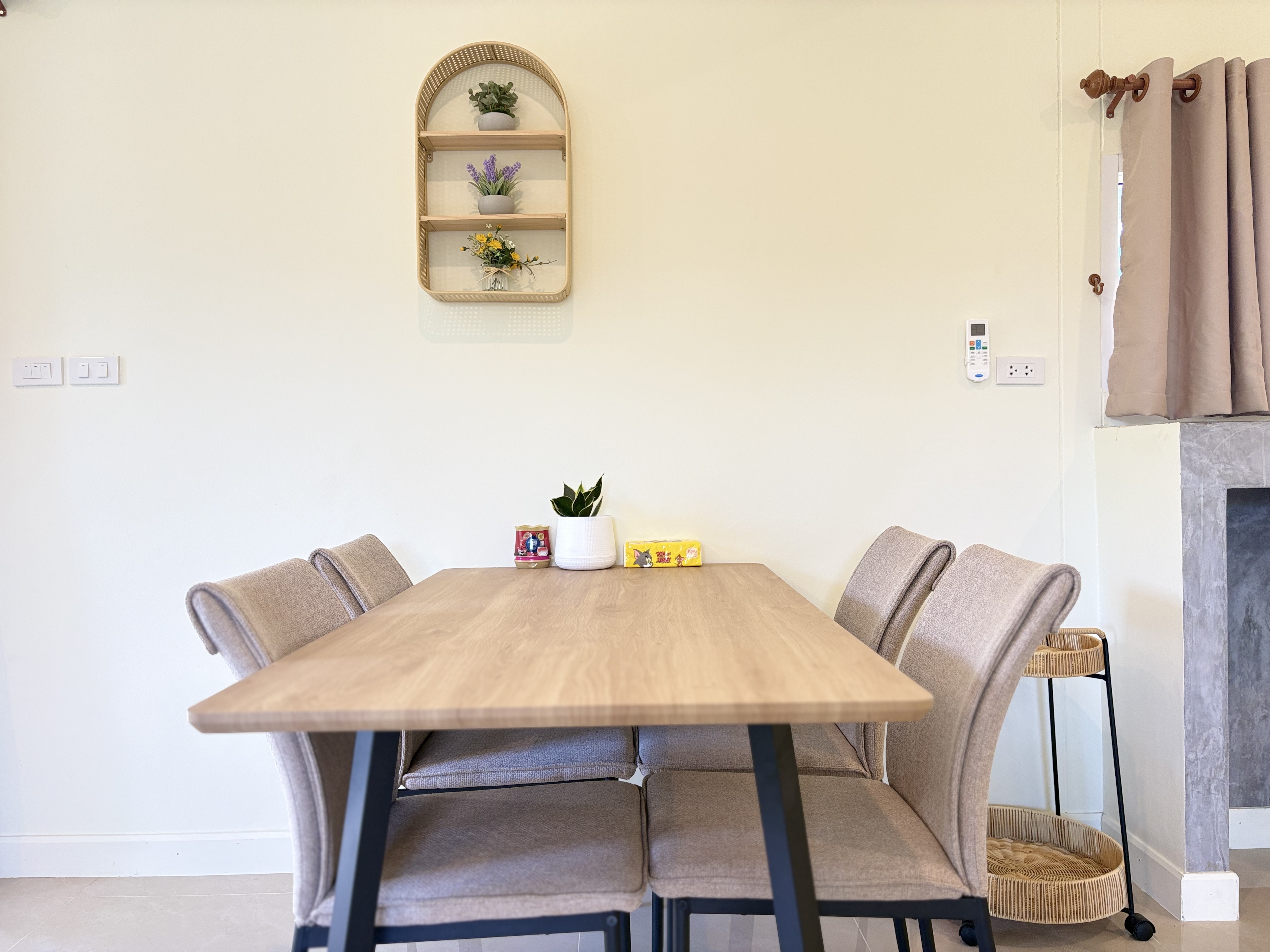 Bright modern dining nook with stylish decor and seating for four