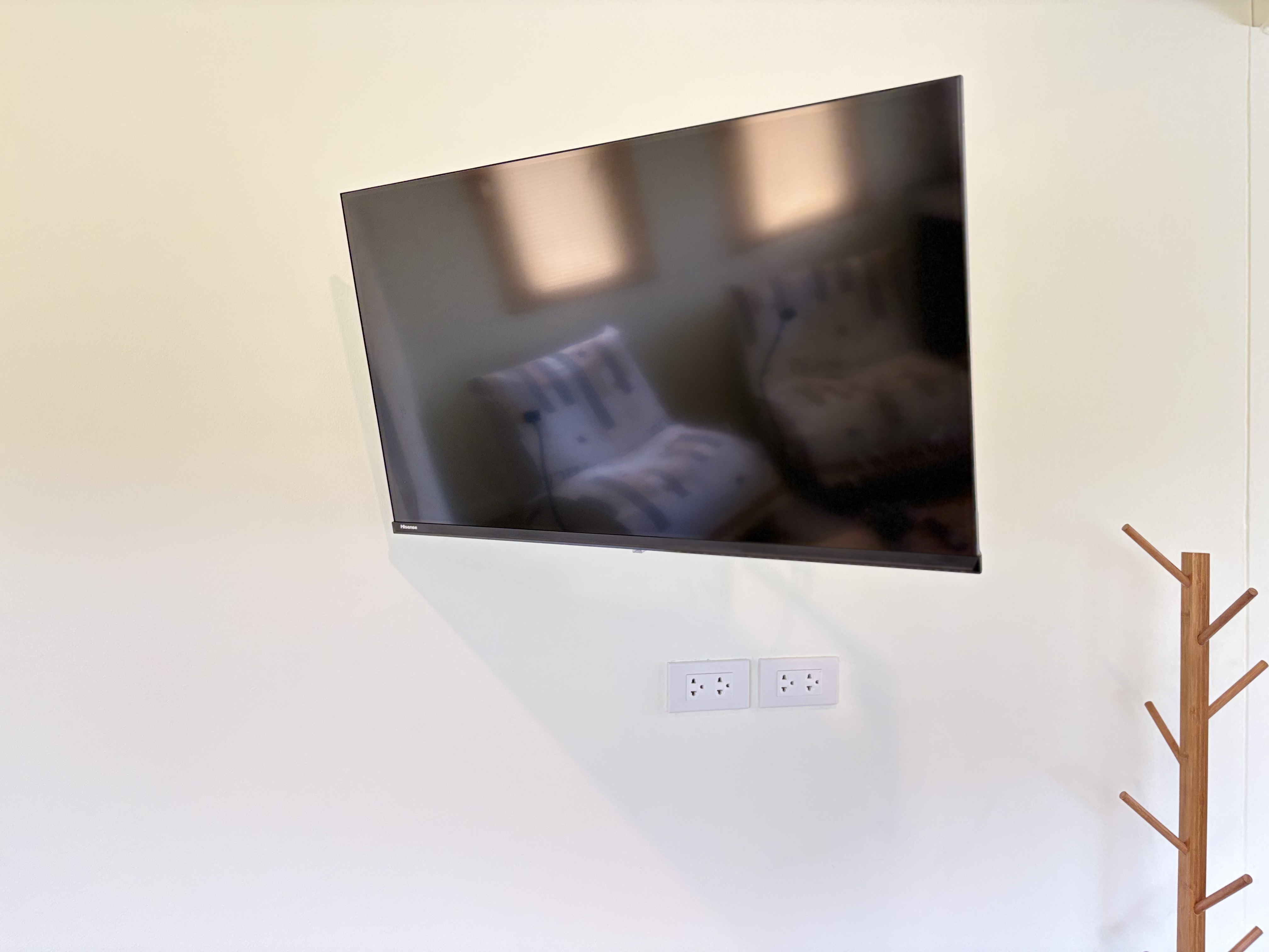 Wall-mounted TV and clean modern setup for easy, comfortable stays