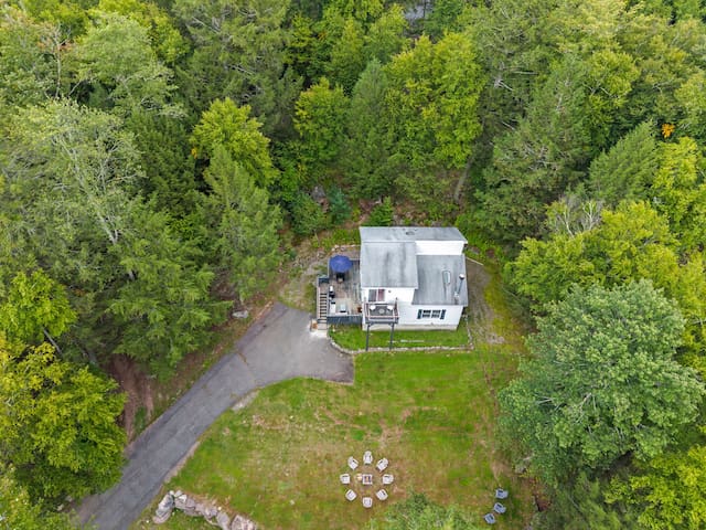 Private woodland retreat with spacious yard and outdoor fire pit