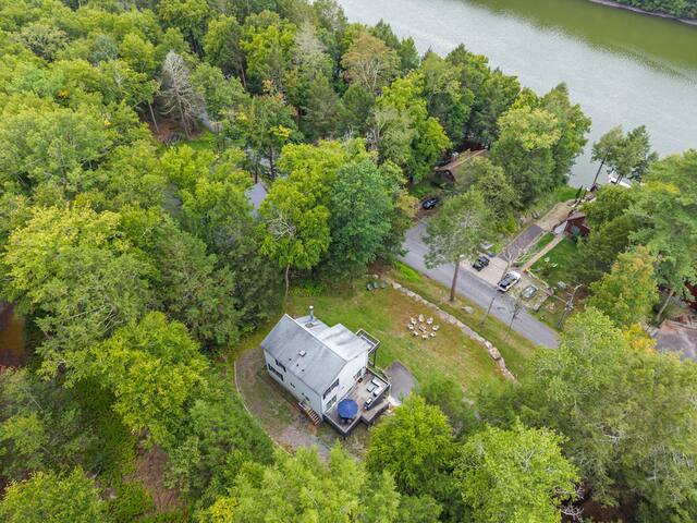 Private woodland retreat near the water with peaceful, scenic surroundings