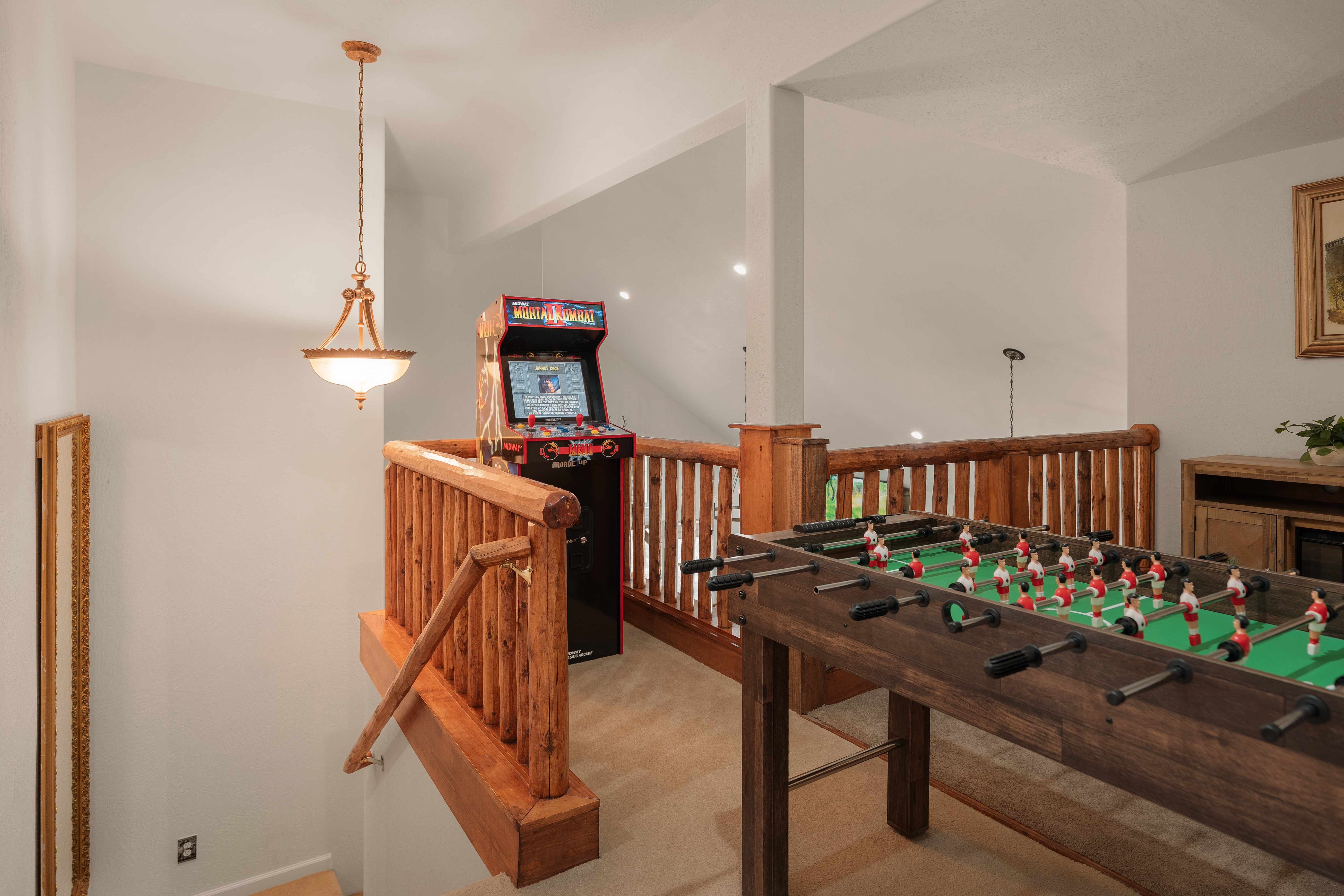 Loft game zone with foosball and arcade fun for all ages