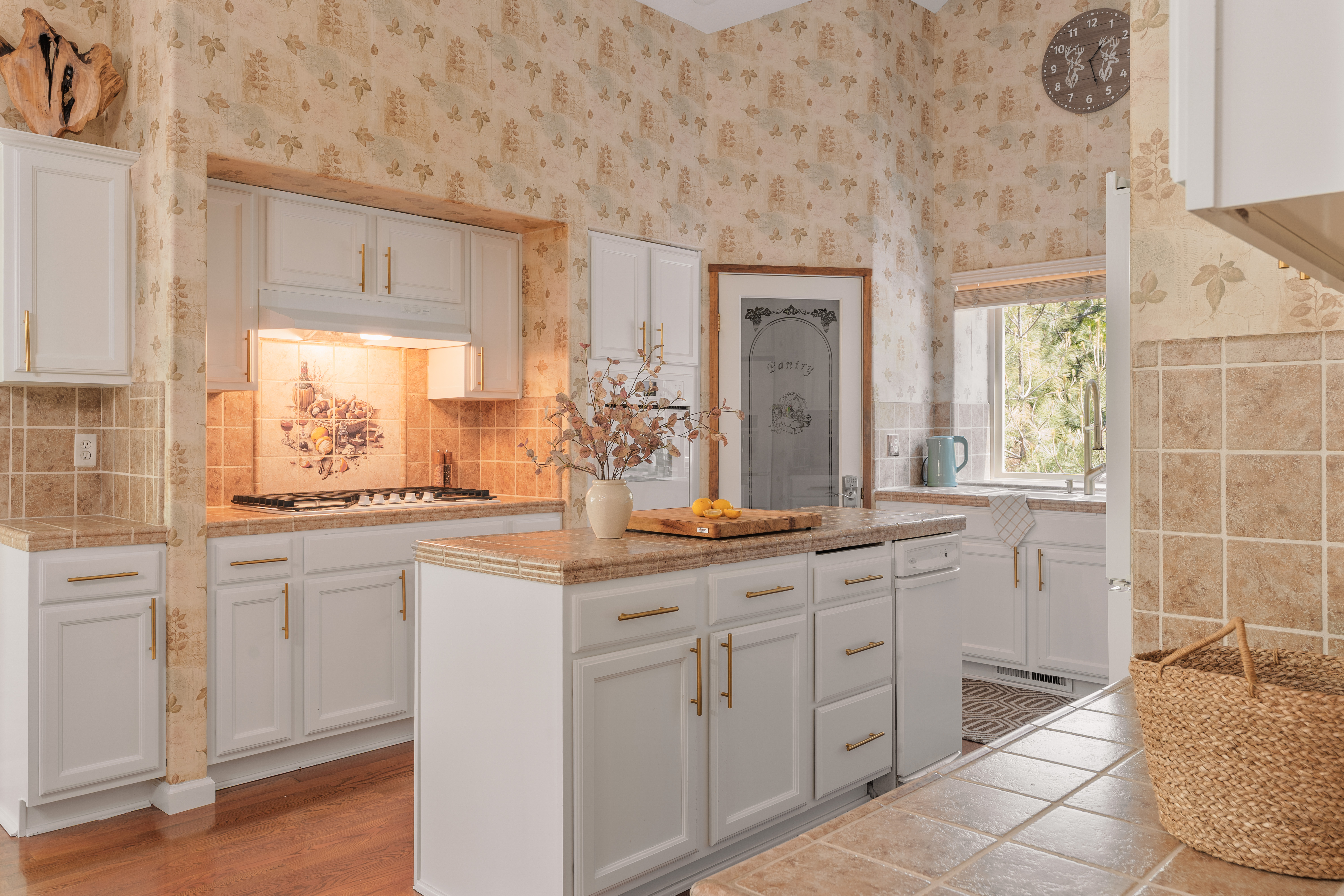 Charming vintage kitchen with island, natural light, and timeless character