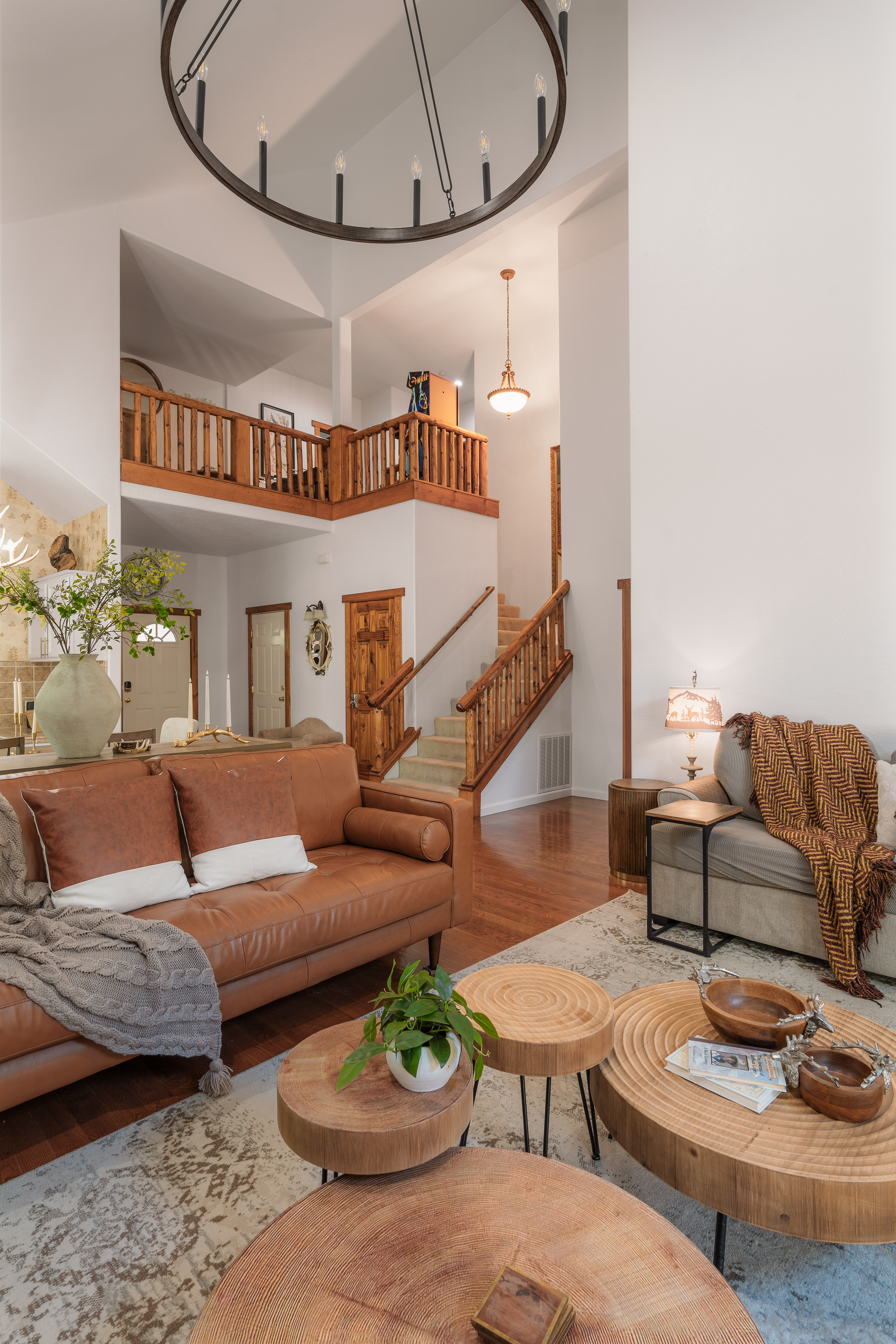Soaring ceilings, warm wood details, and a stylish open living space