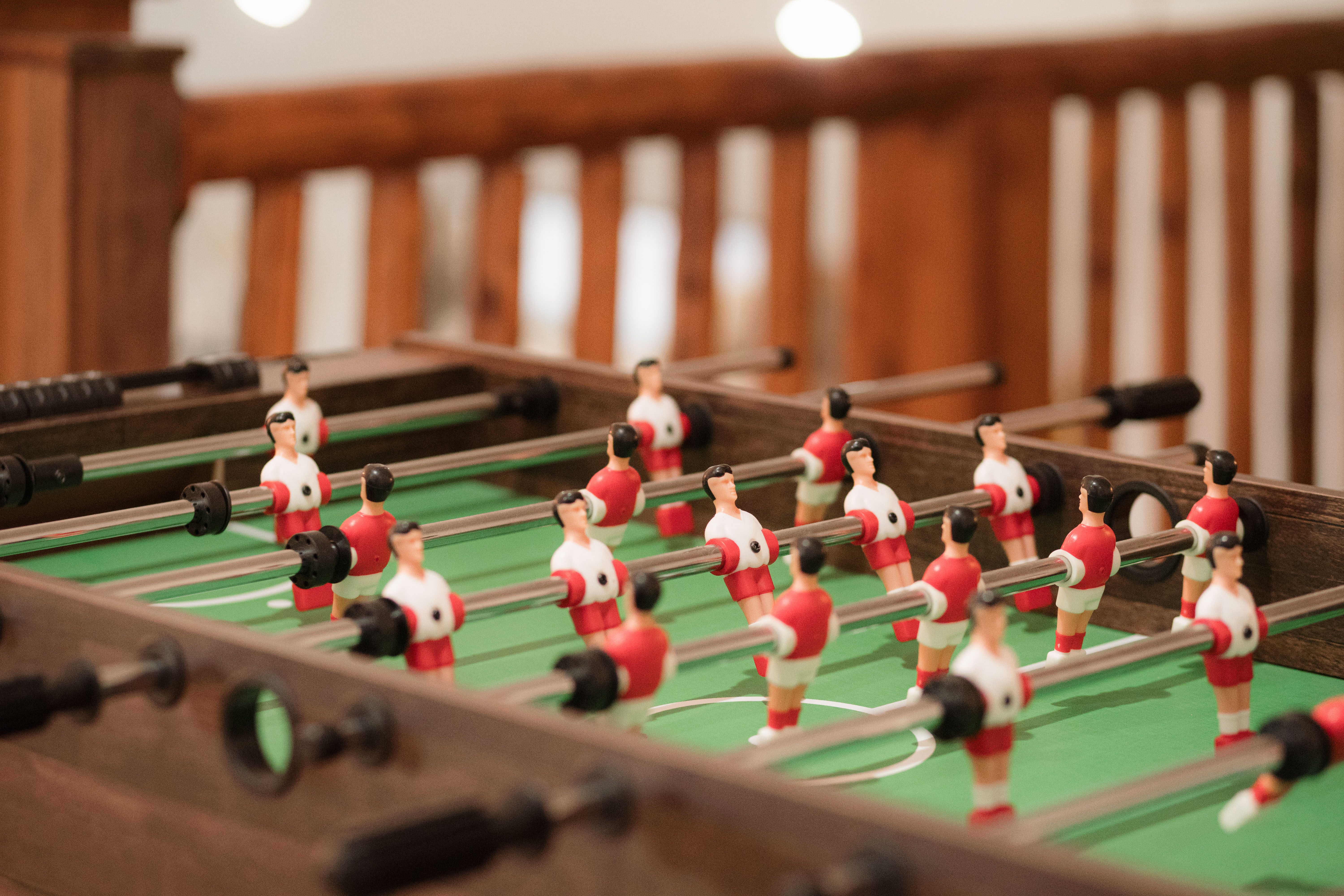 Foosball fun adds a cozy, family-friendly game room touch