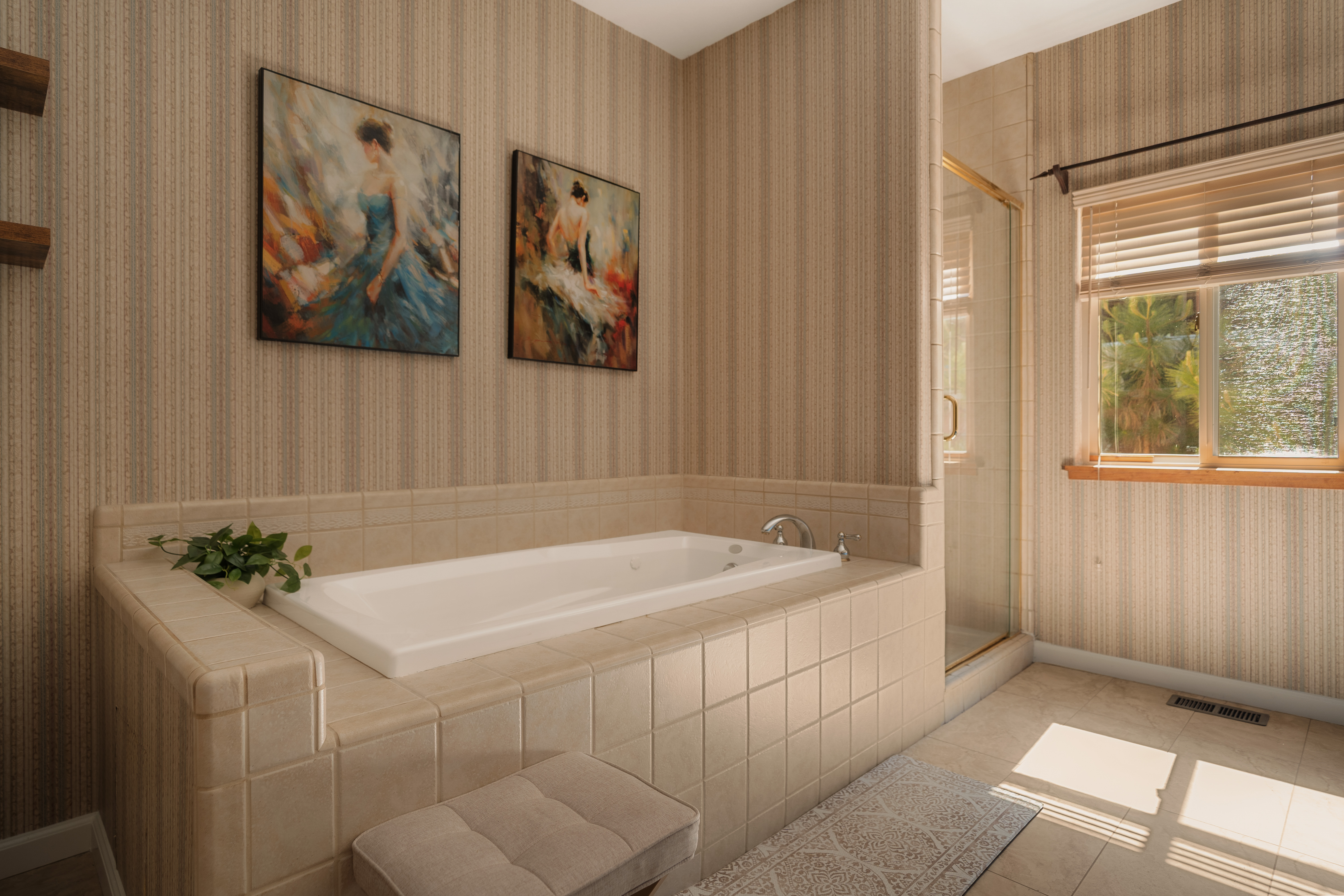 Relax in a bright spa-style bathroom with soaking tub and separate shower