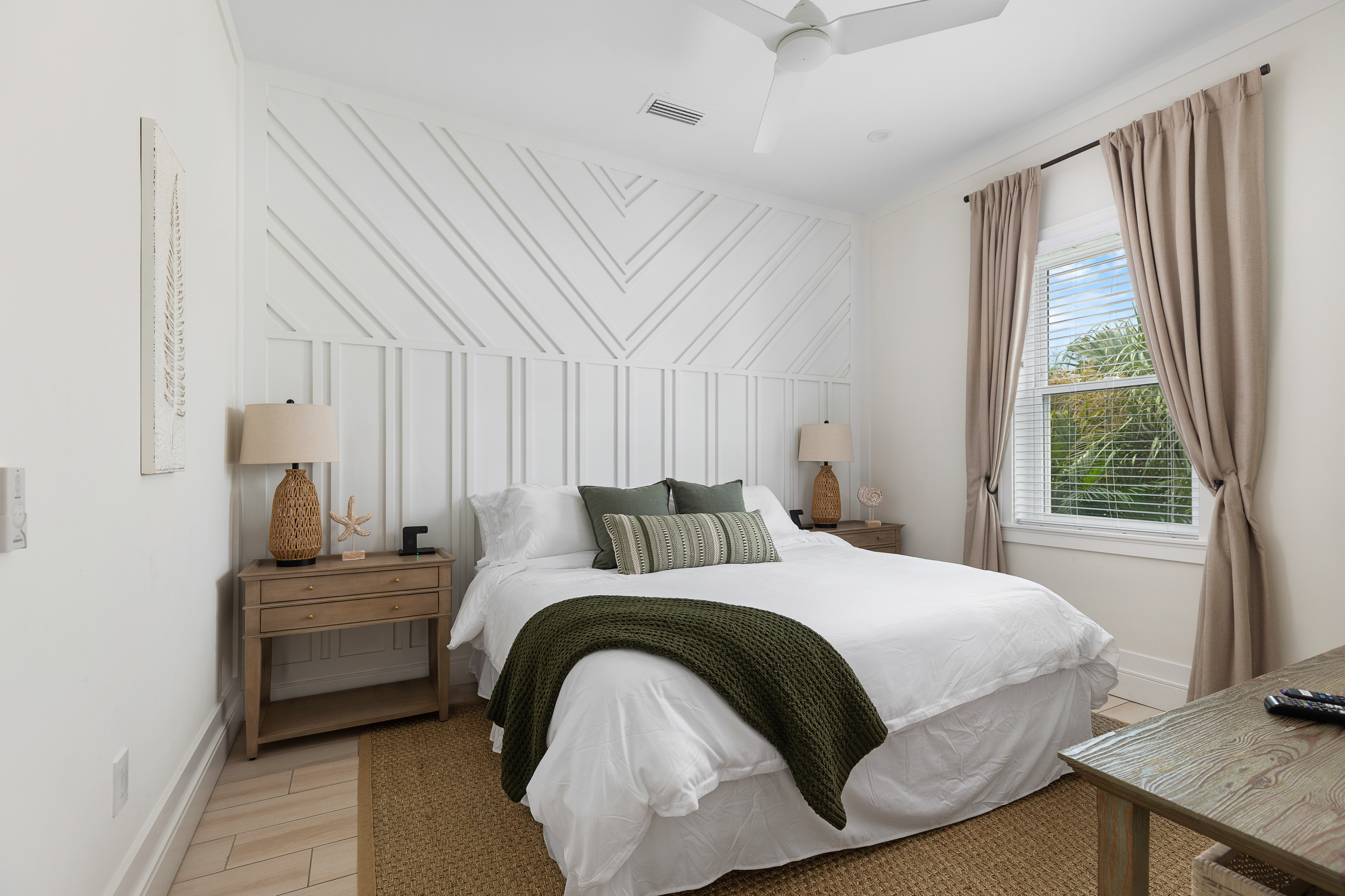 King guest suite with hotel-grade linens and bedside USB charging