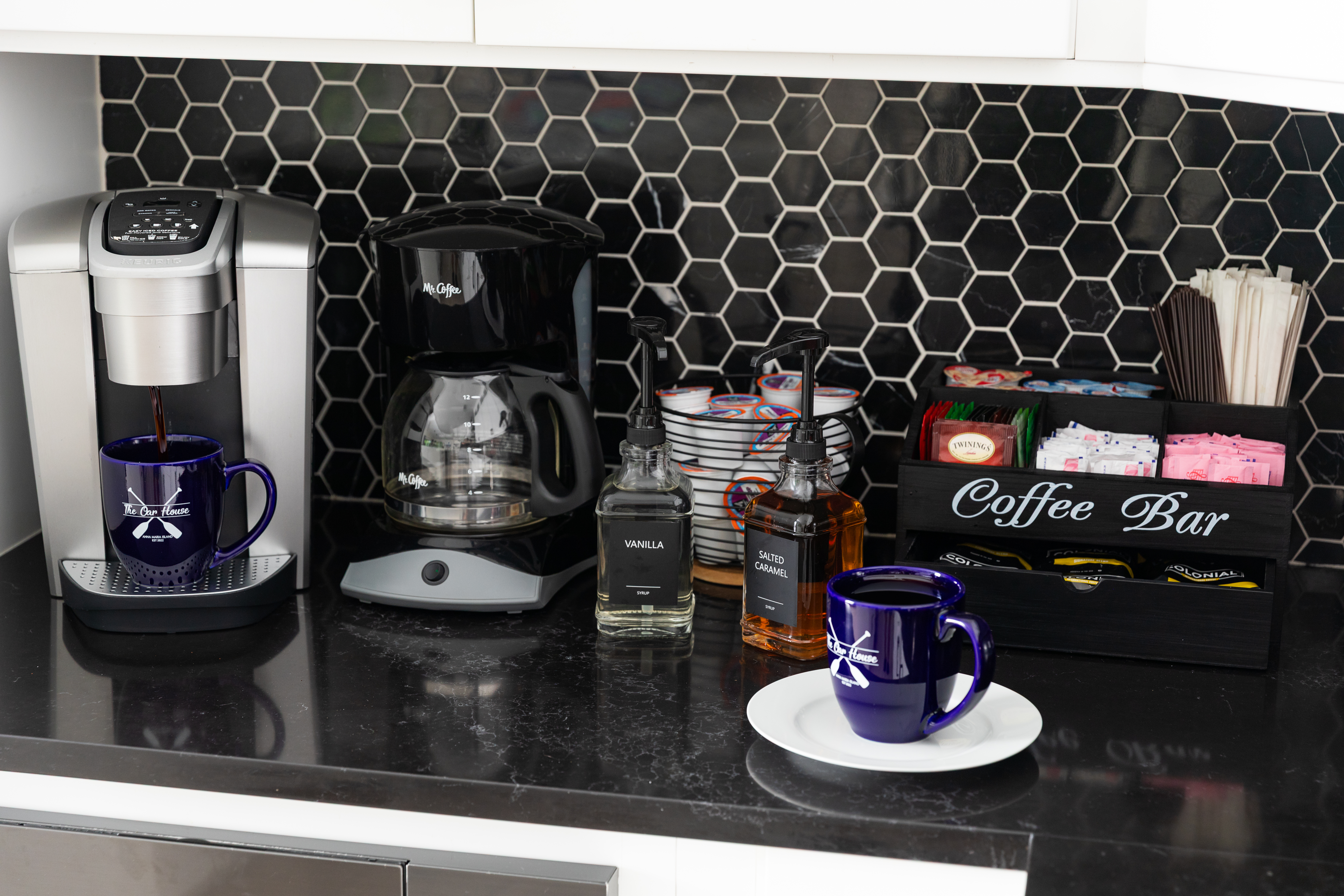 Coffee bar with Keurig Duo, drip brewer, syrups, pods and teas