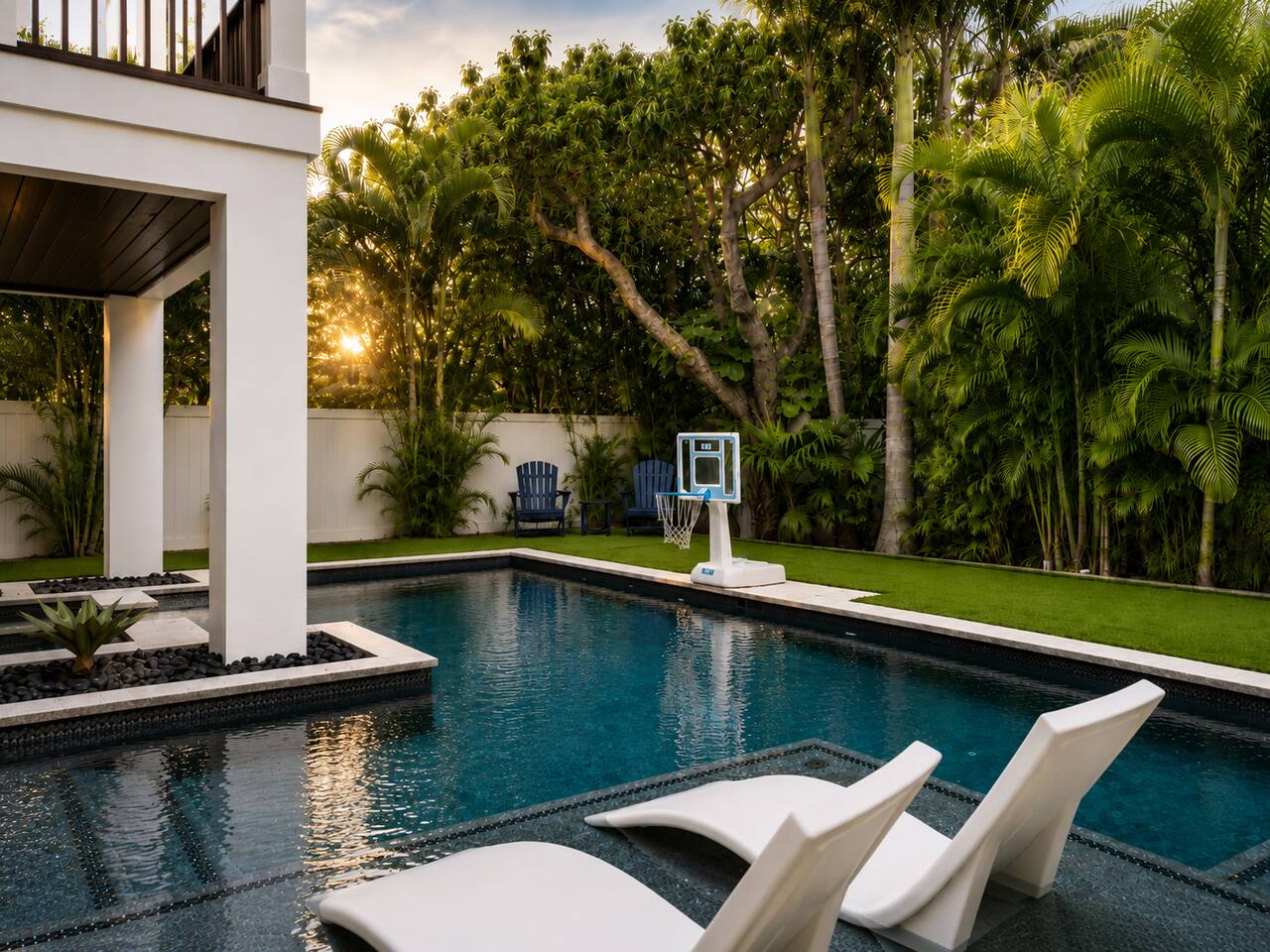 Pool sunset with loungers