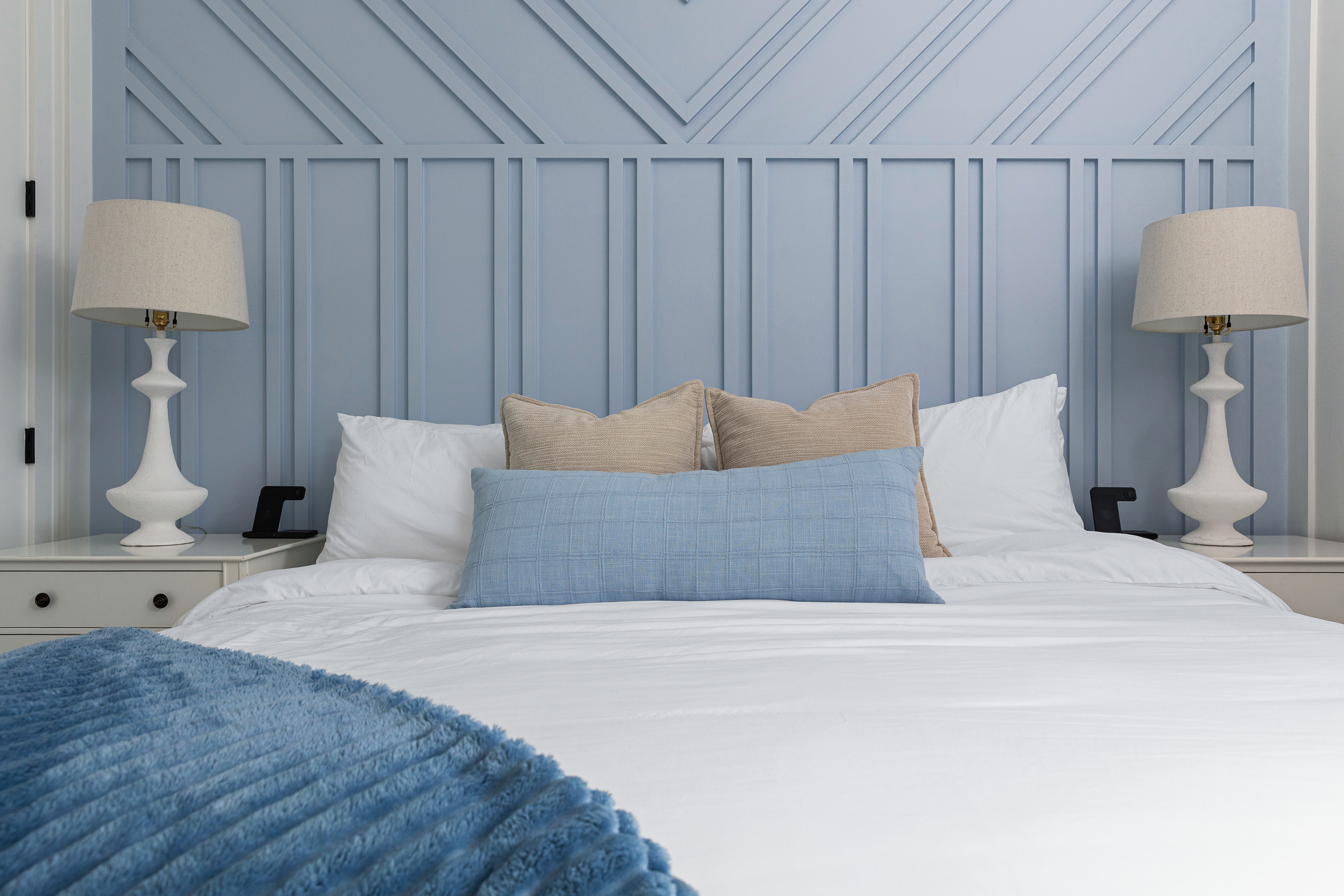 King bedroom with custom blue accent wall