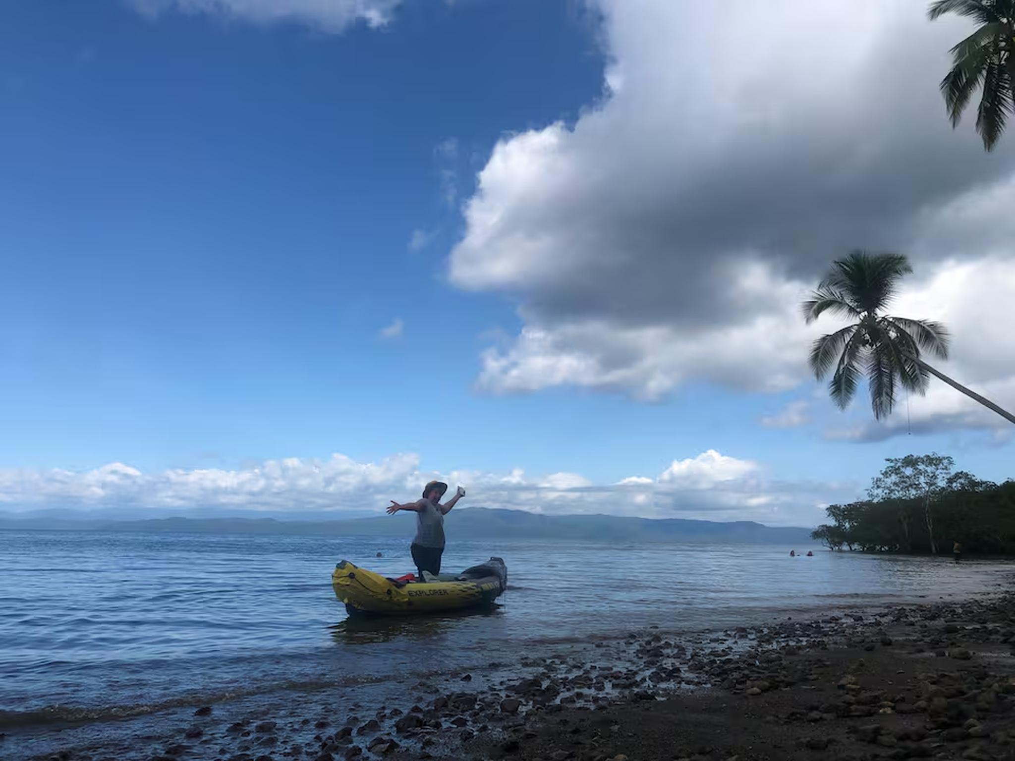 Peaceful tropical beachfront with calm waters and island adventure vibes