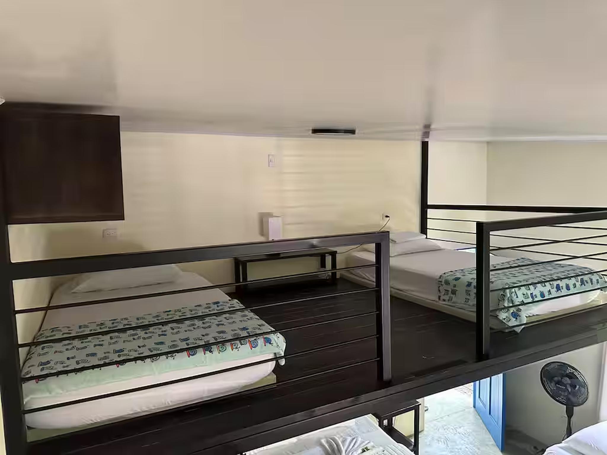 Cozy loft with two twin beds—ideal extra sleeping space for families or friends